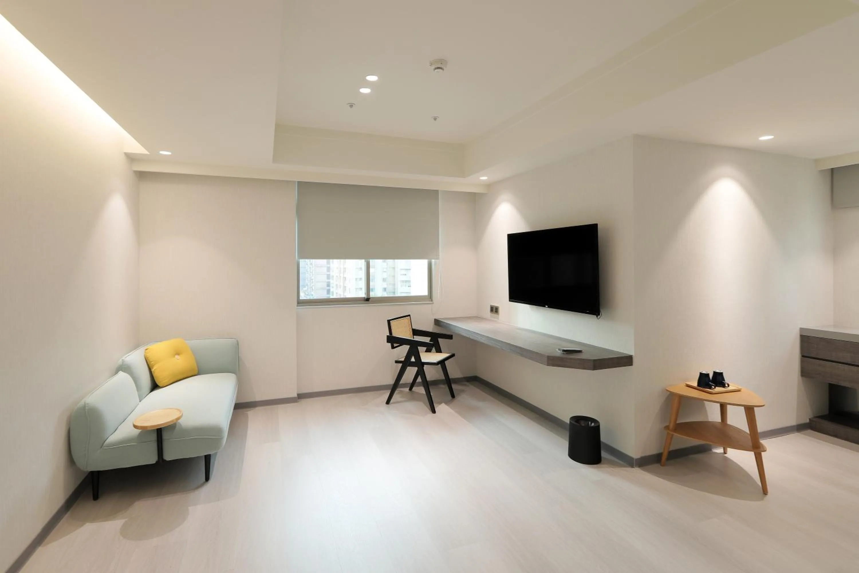 Living room, Bed in Dahu Park Hotel