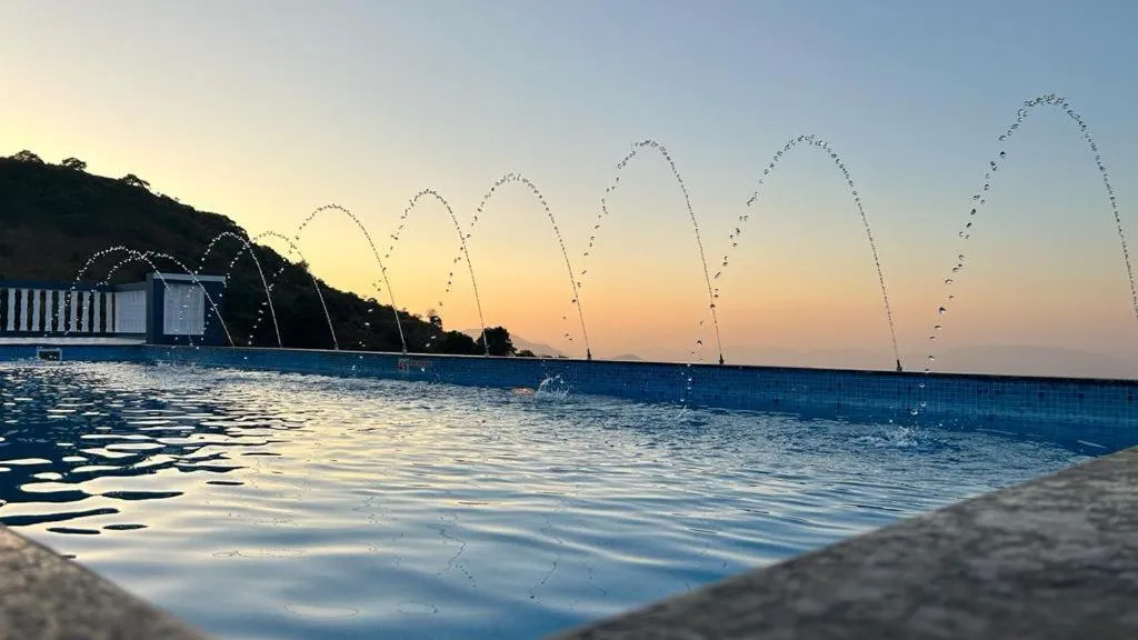 Swimming pool in Hilltop Resort and Glamping Wai, Near Panchgani