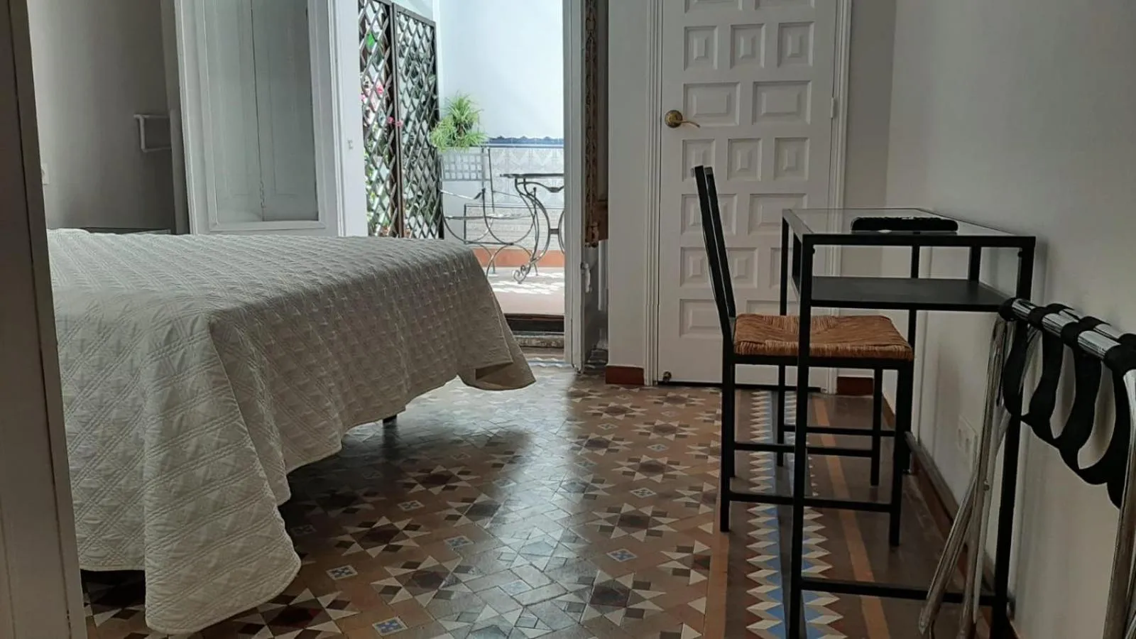 Decorative detail, Bed in Casa Consell Bailen, Guest House