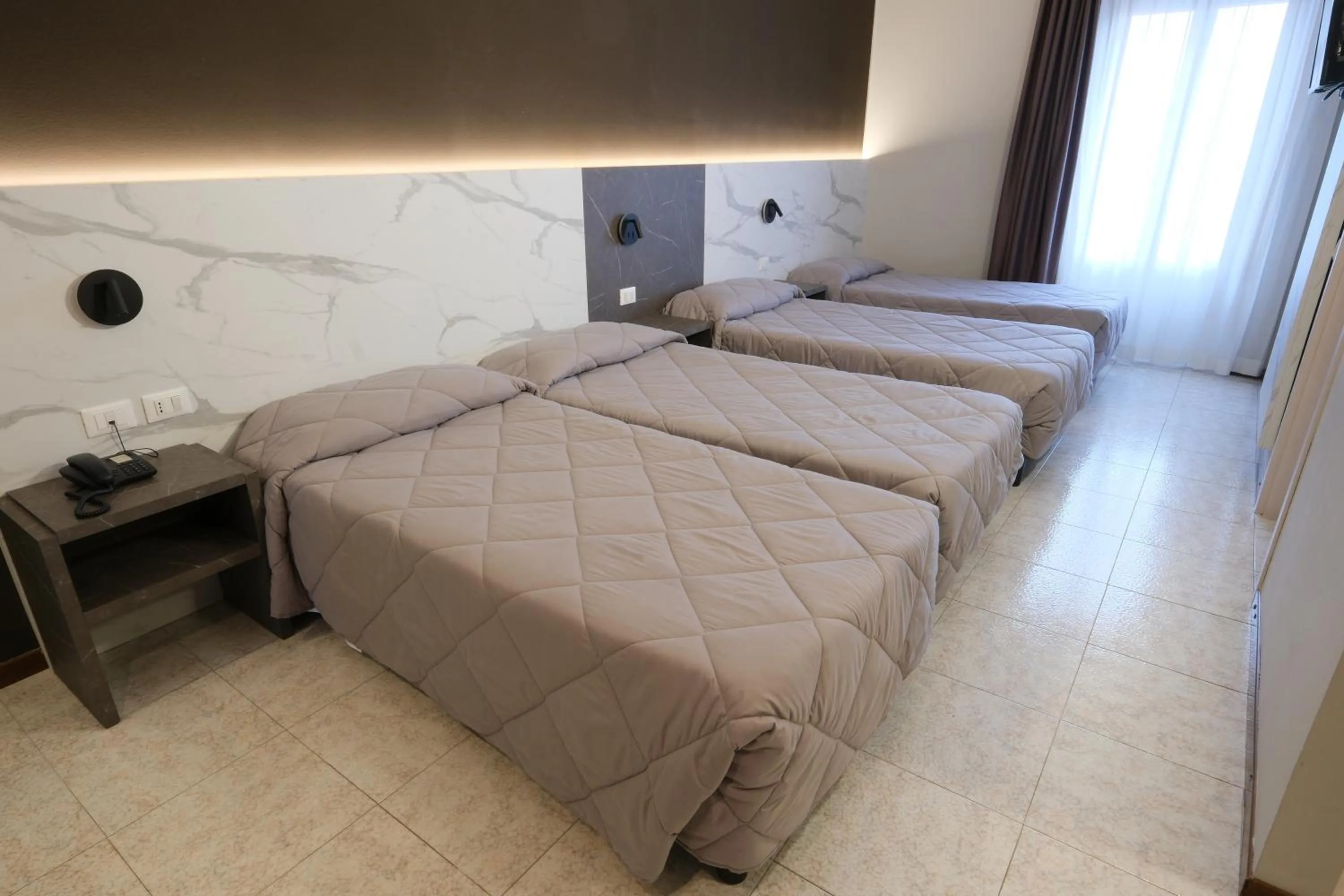 Bed in Hotel Mistral