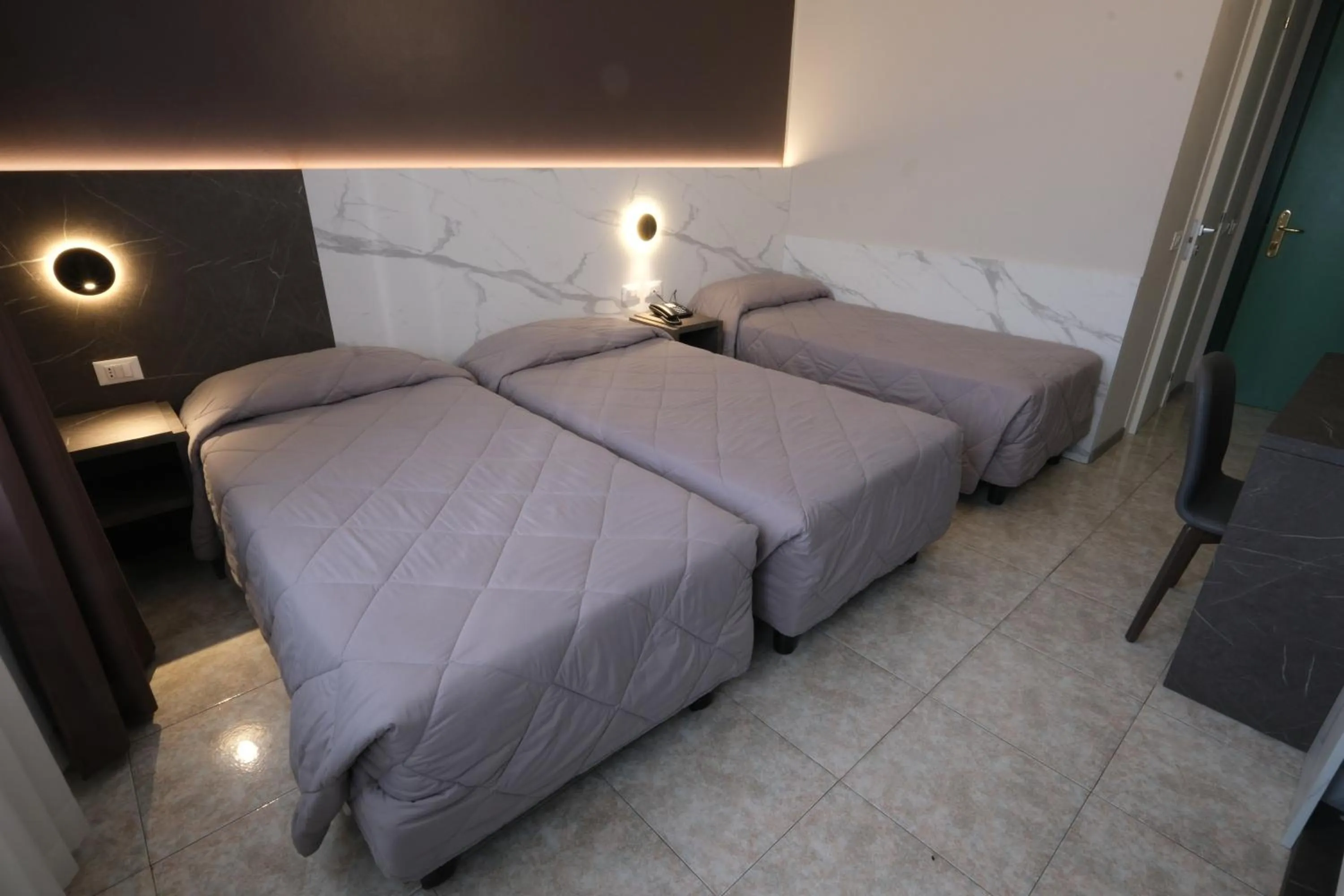 Bed in Hotel Mistral