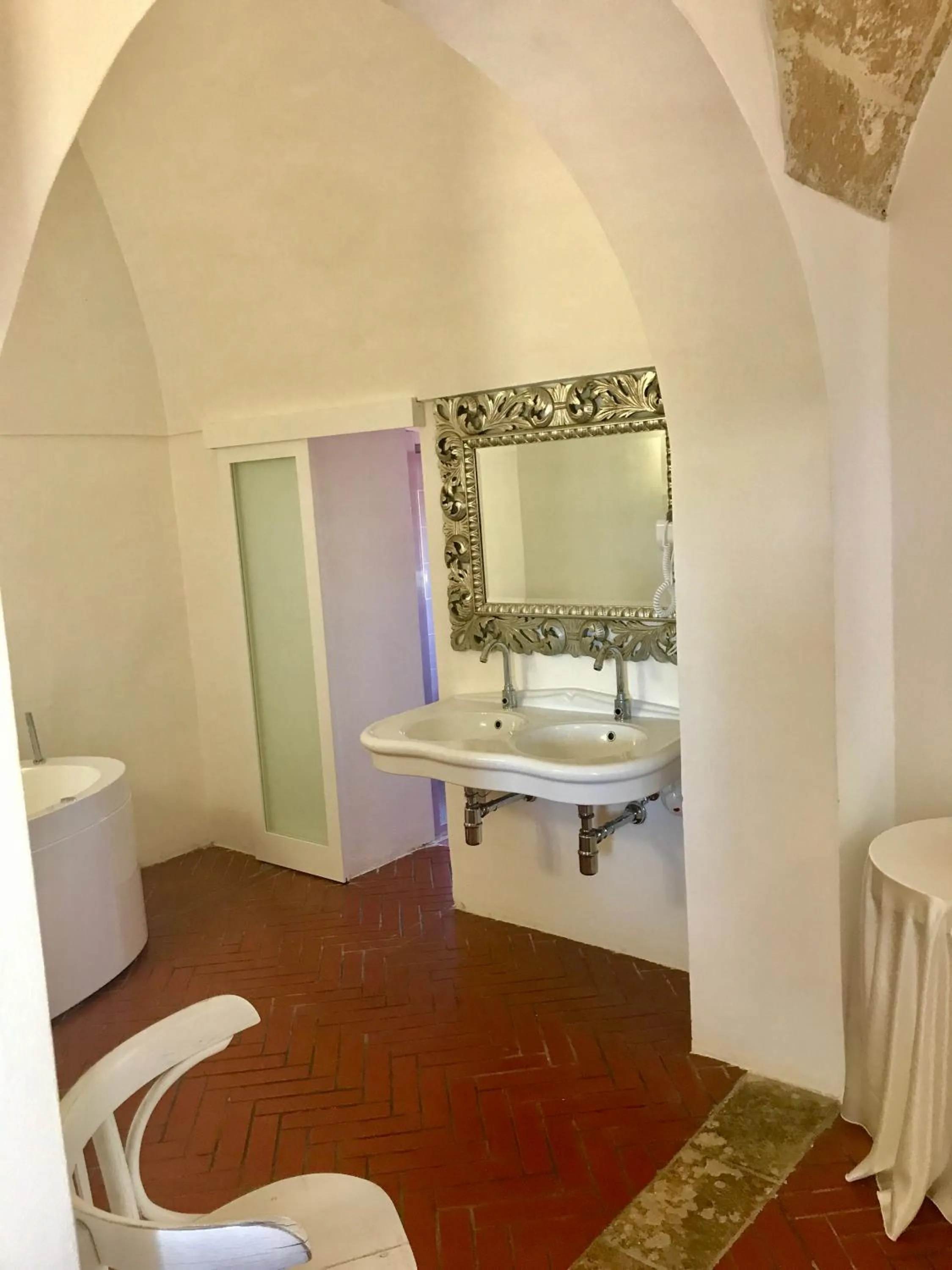 Bathroom in RELAIS MASSERIA CASINA DEI CARI