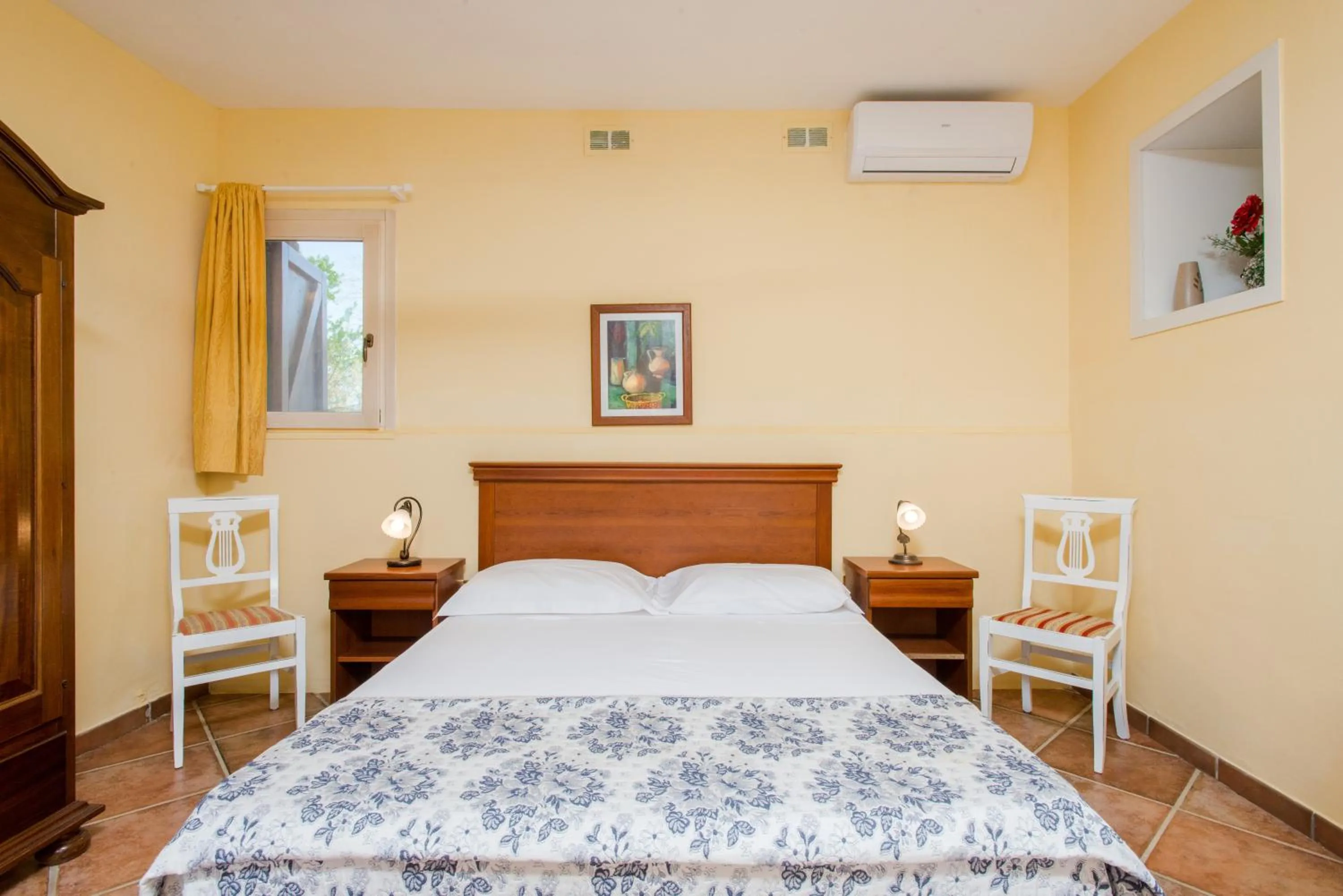 Bed in RELAIS MASSERIA CASINA DEI CARI