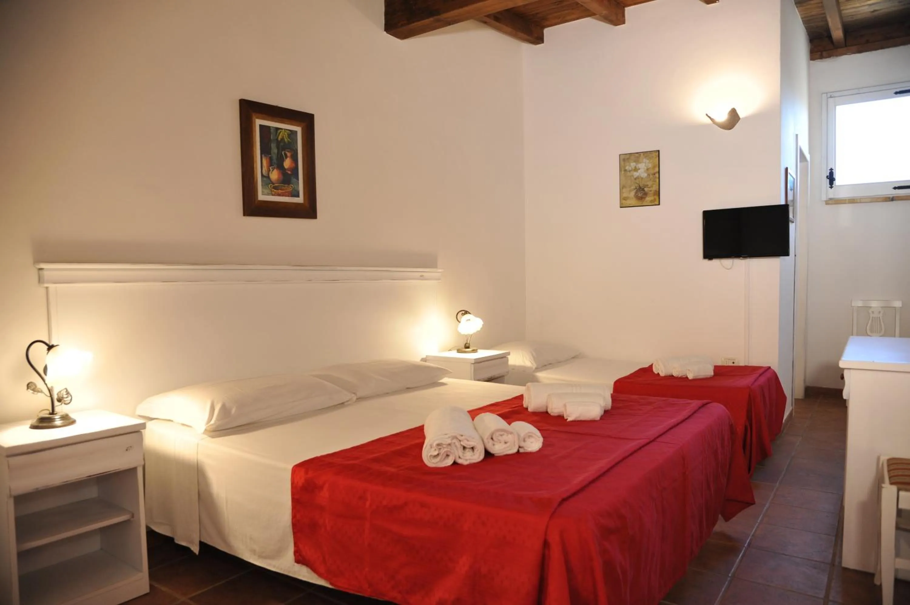 Bed in RELAIS MASSERIA CASINA DEI CARI