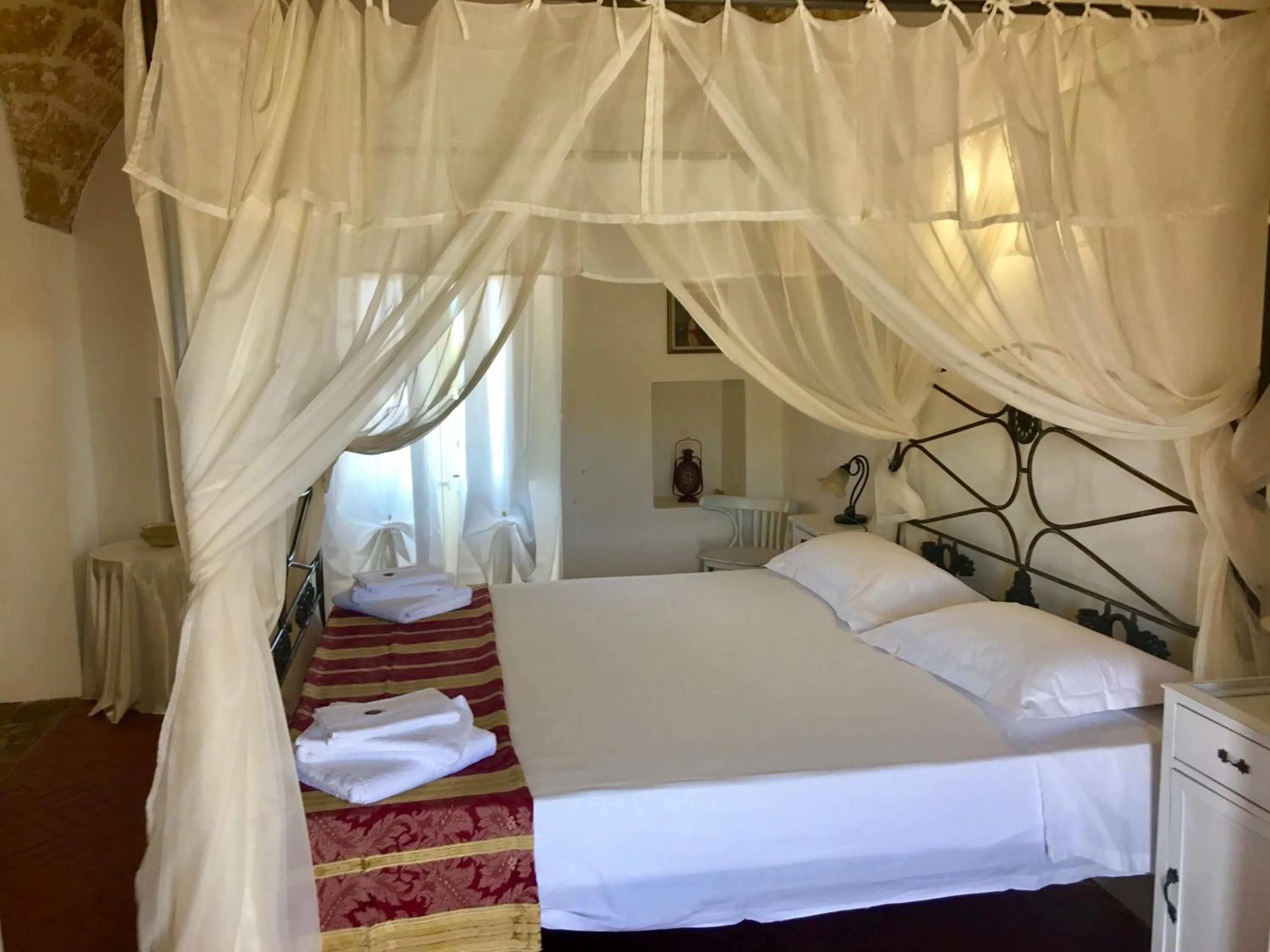 Photo of the whole room in RELAIS MASSERIA CASINA DEI CARI