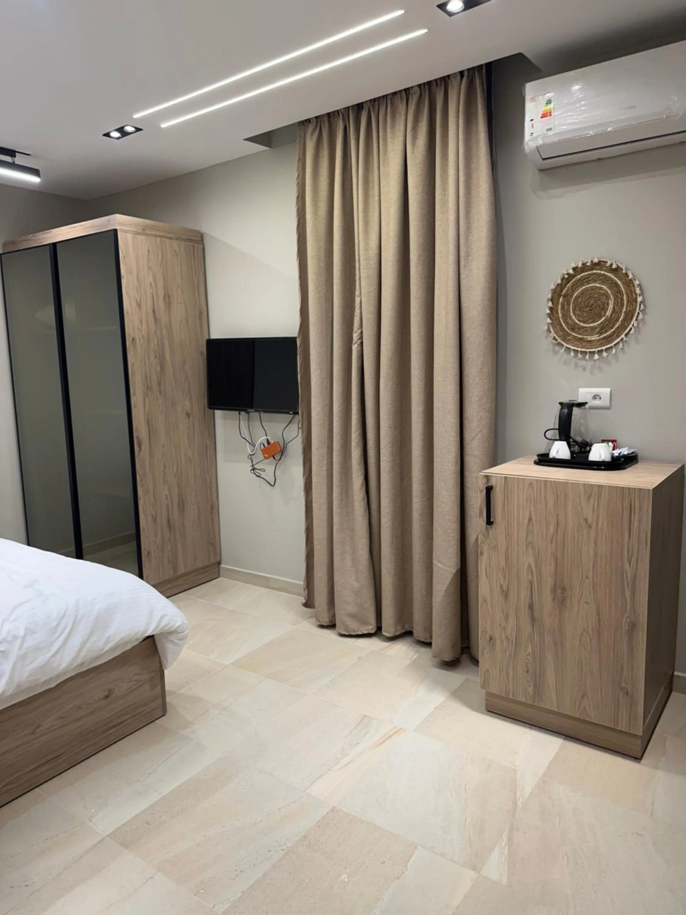 Bed in Pyramids Height Hotel & Pyramids Master Scene Rooftop