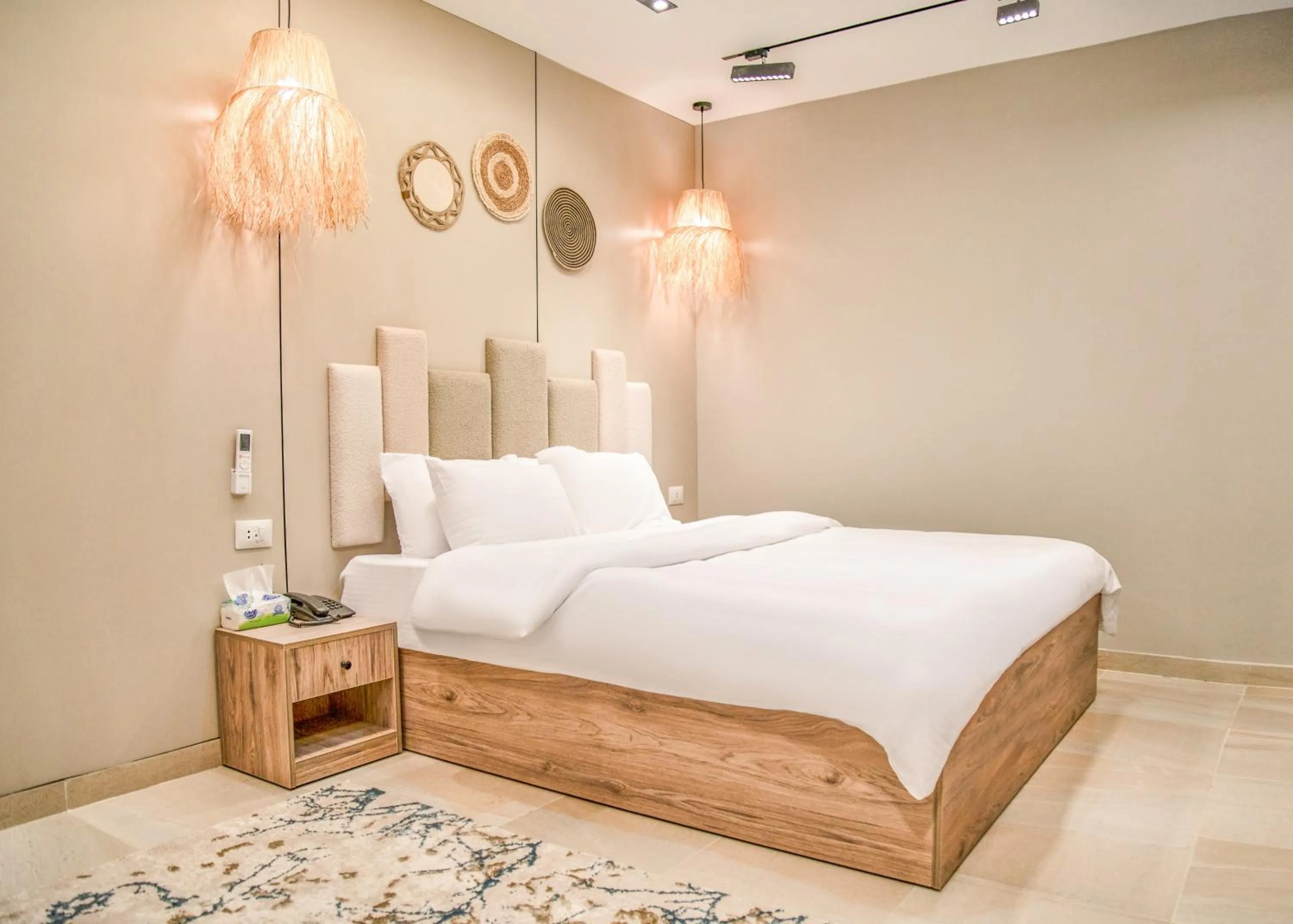 Bed in Pyramids Height Hotel & Pyramids Master Scene Rooftop