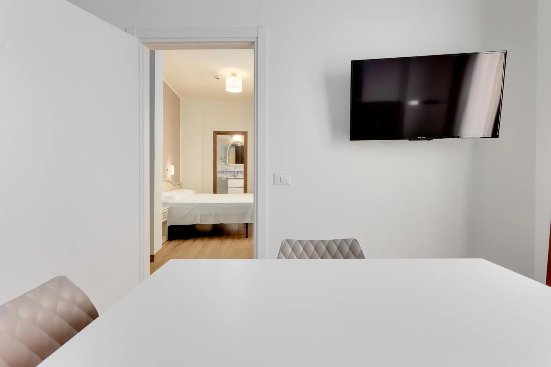 Kitchen or kitchenette, Bed in Hotel Schiller
