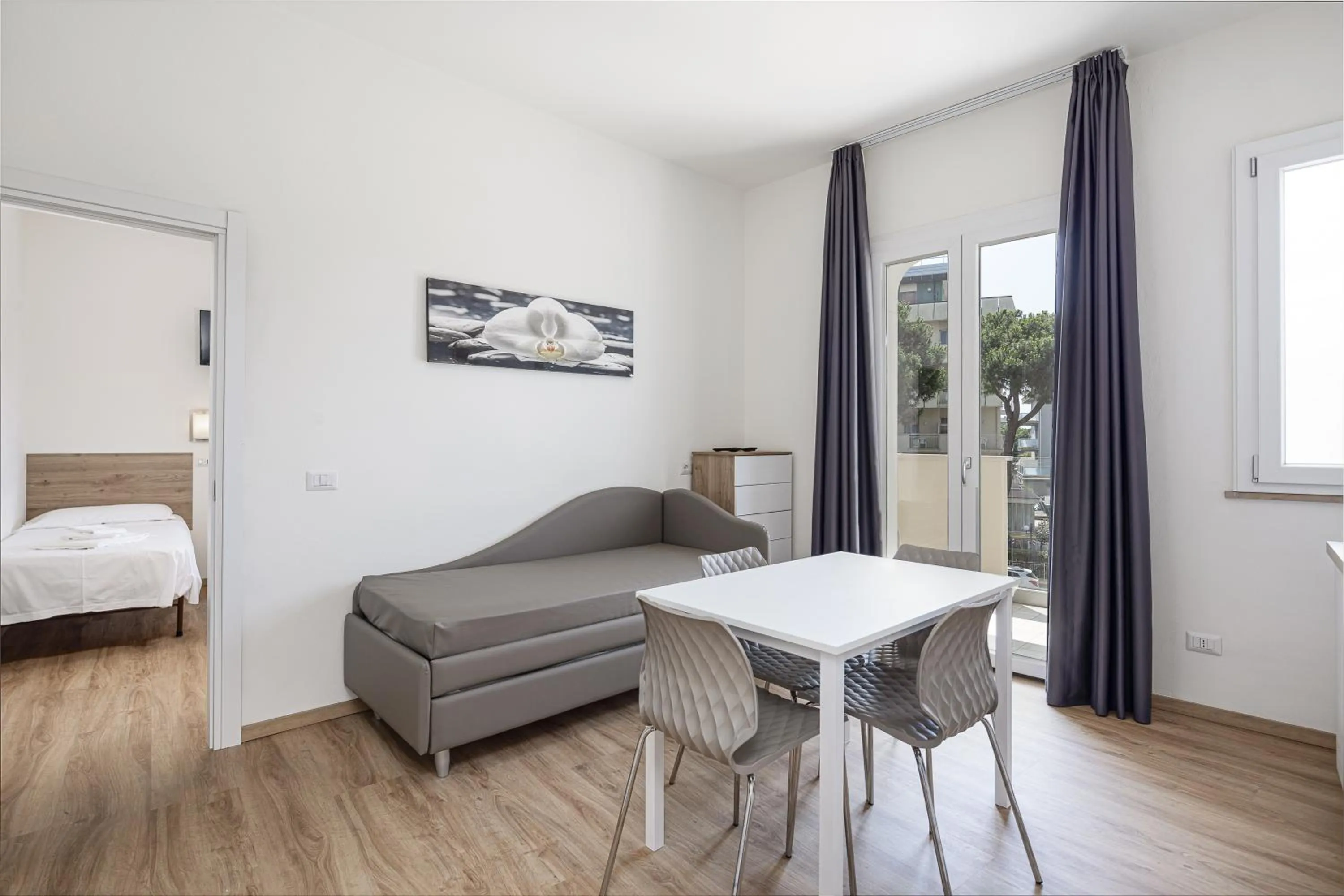 Living room, Bed in Hotel Schiller