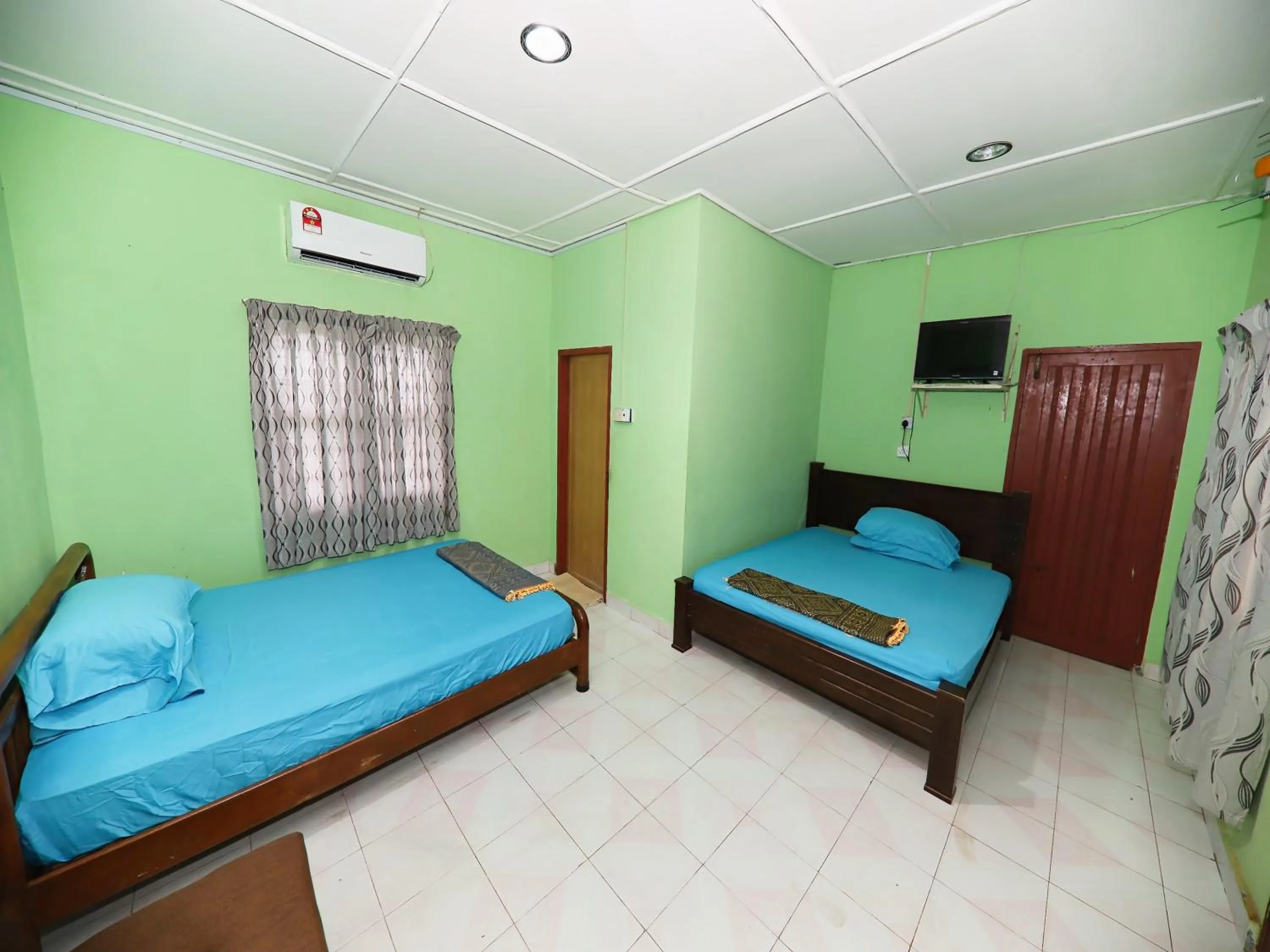 Bedroom in Hotel O Bayu Chalet