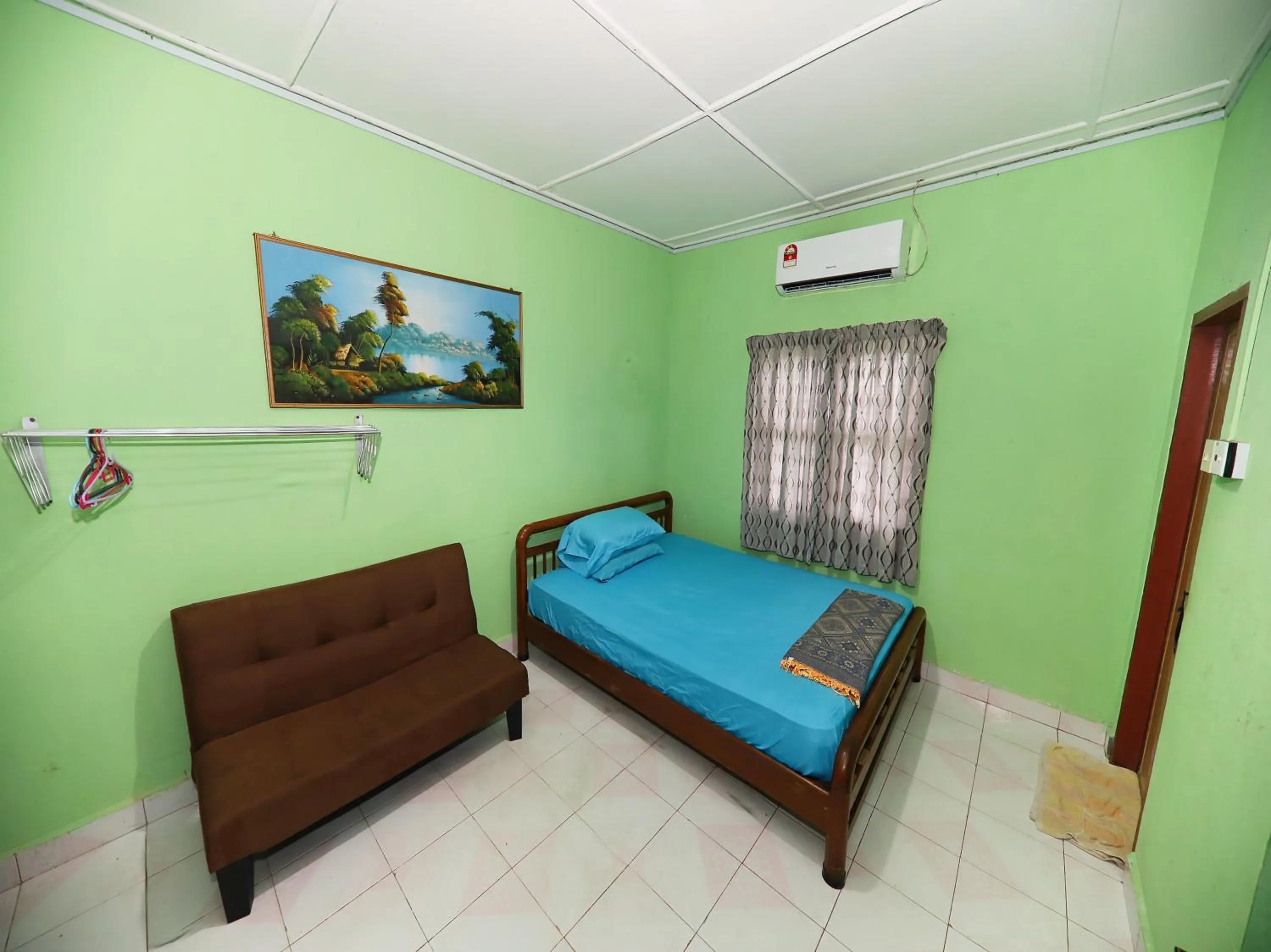 Bedroom in Hotel O Bayu Chalet