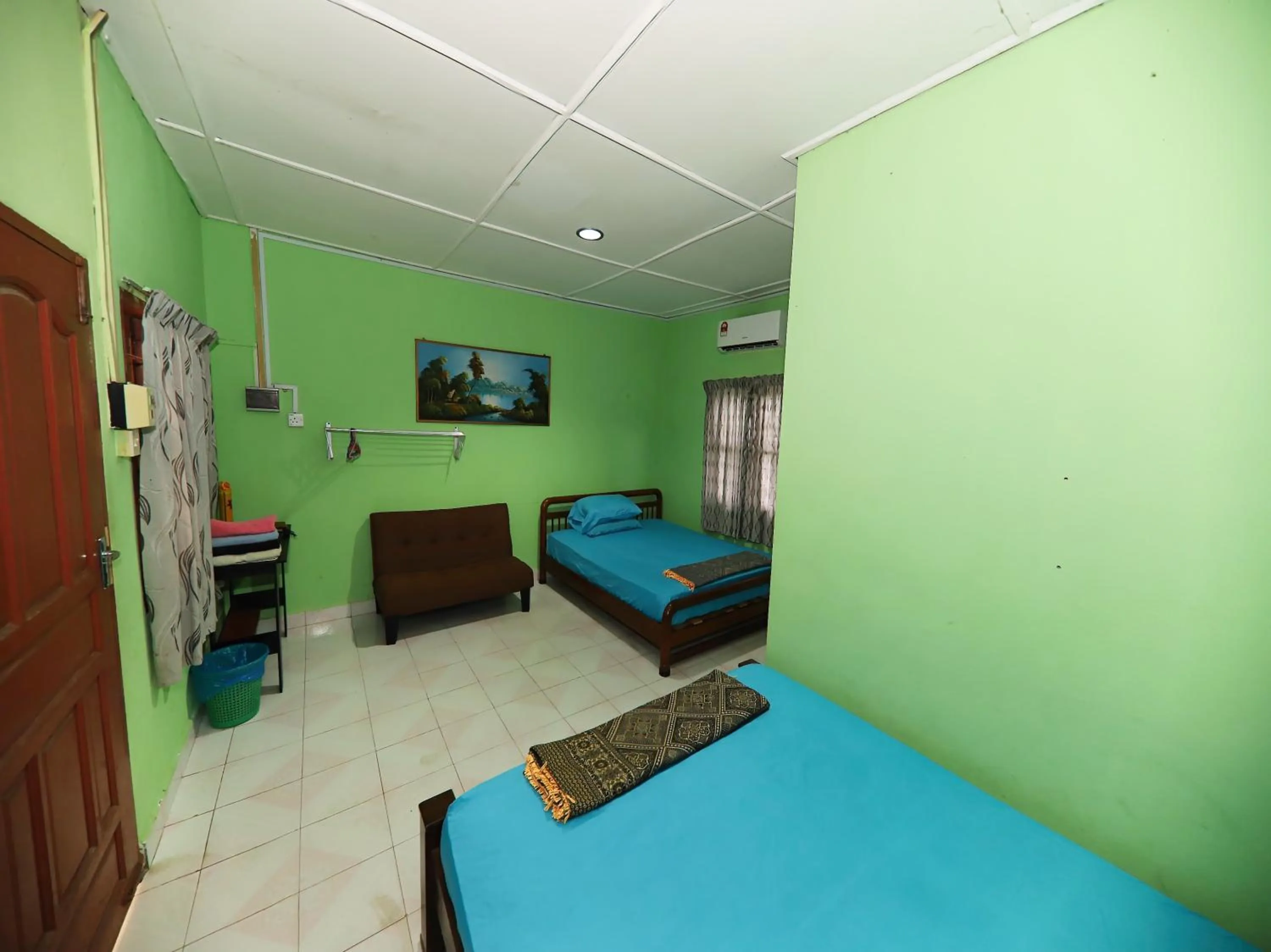 Bedroom in Hotel O Bayu Chalet