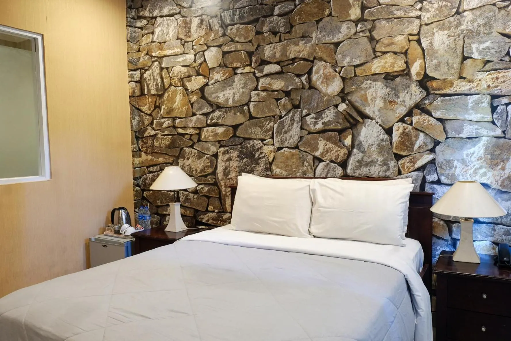 Bed in Su's Cottages Legian