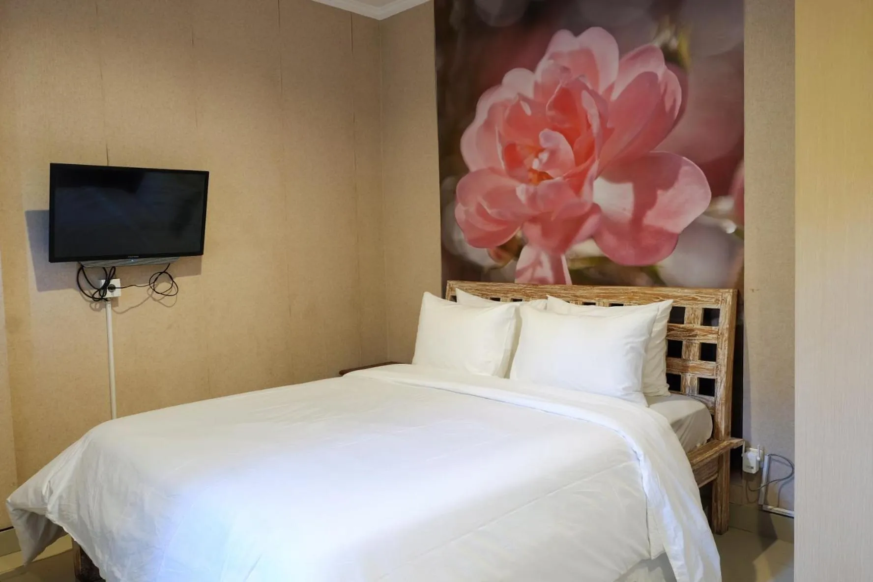 Bed in Su's Cottages Legian