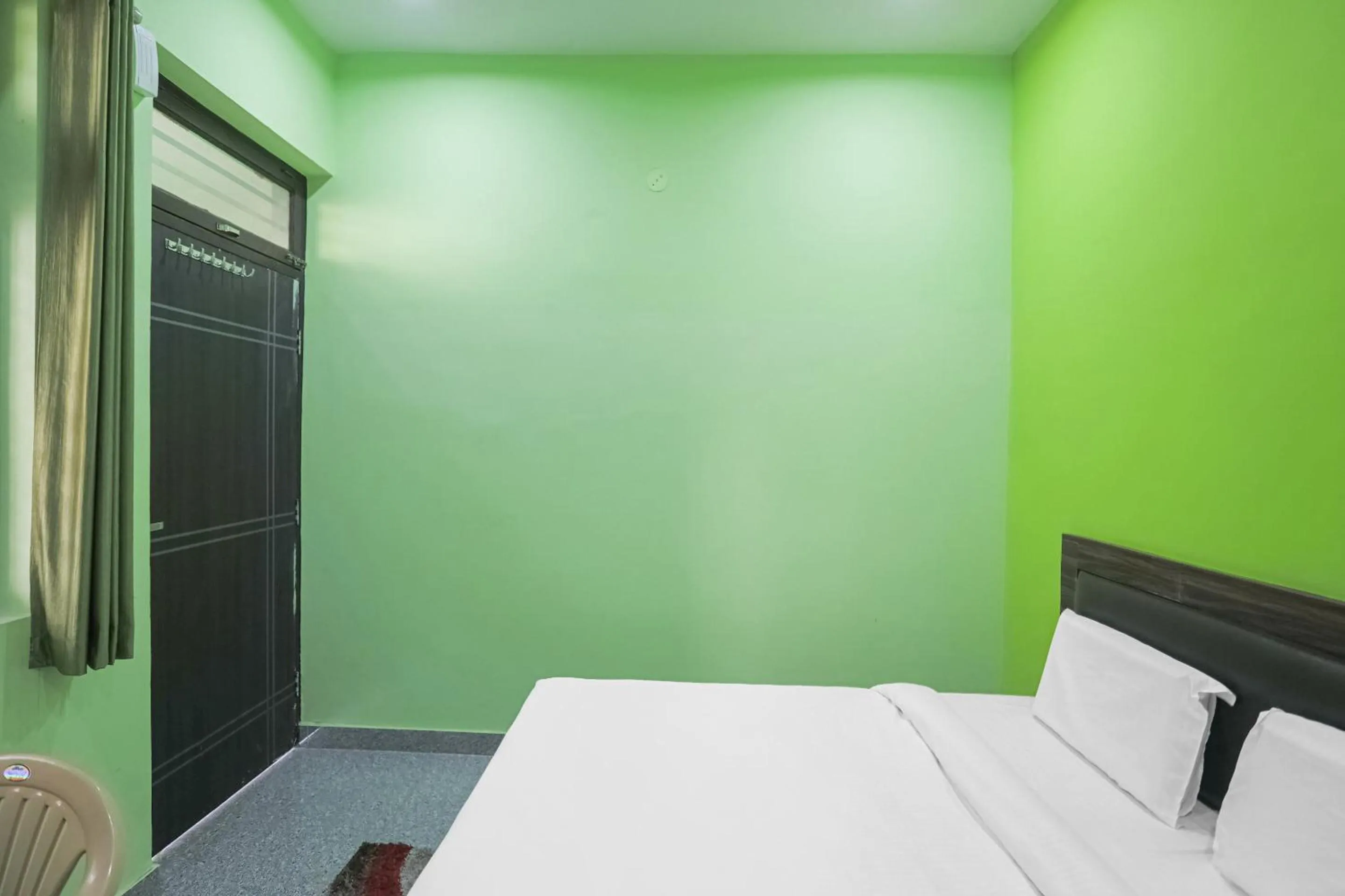 Bedroom in Capital O A-one