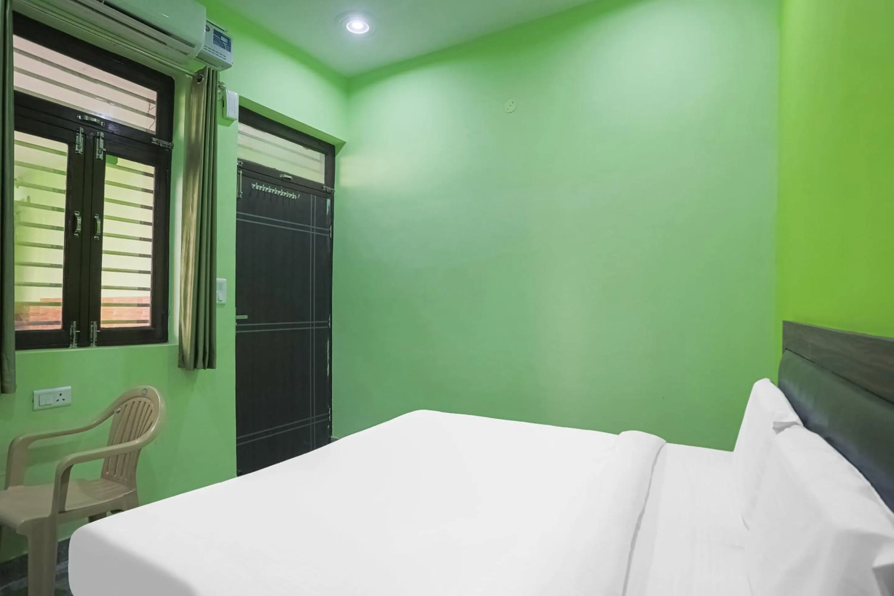 Bedroom in Capital O A-one