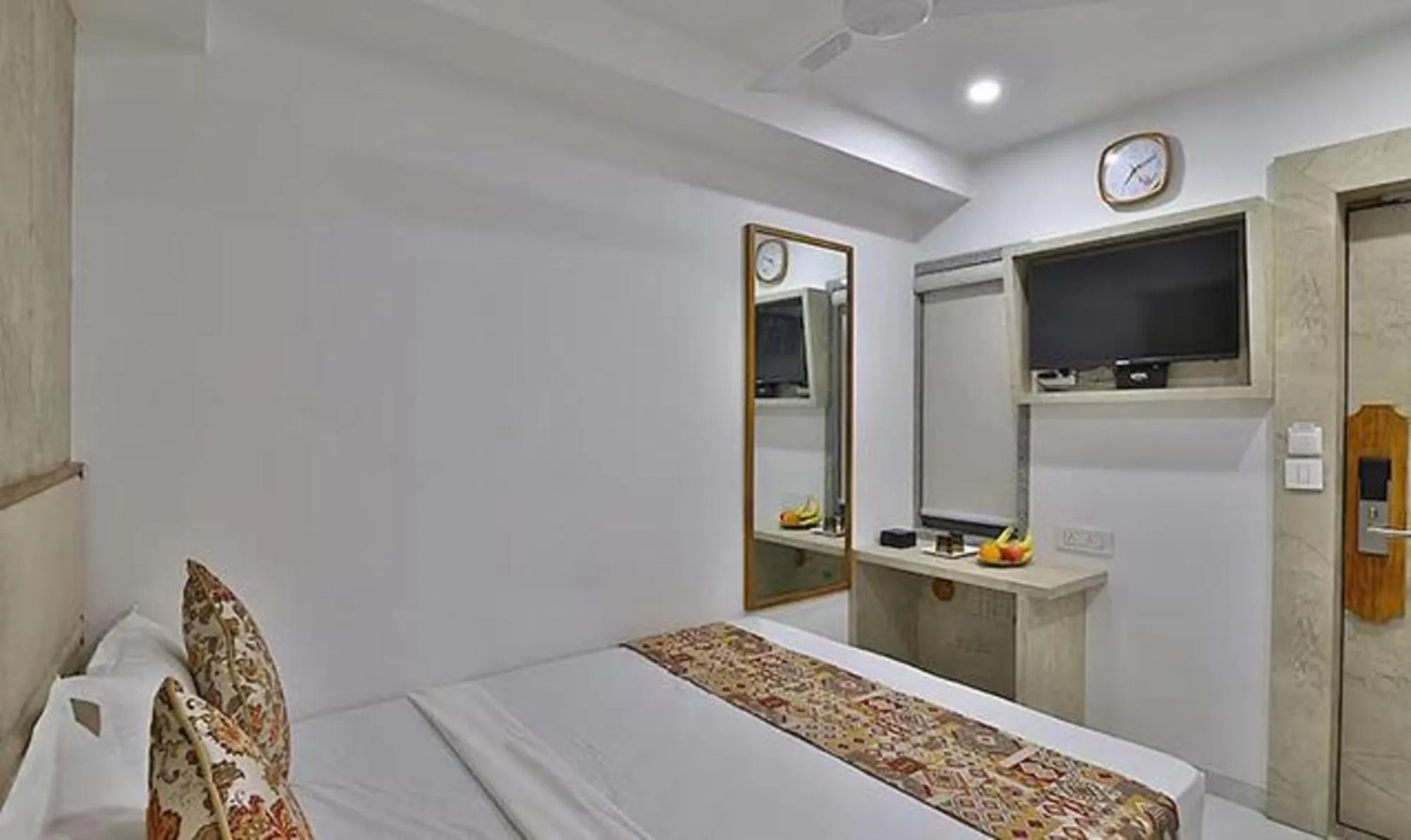 Bed in FabHotel Prime Legend