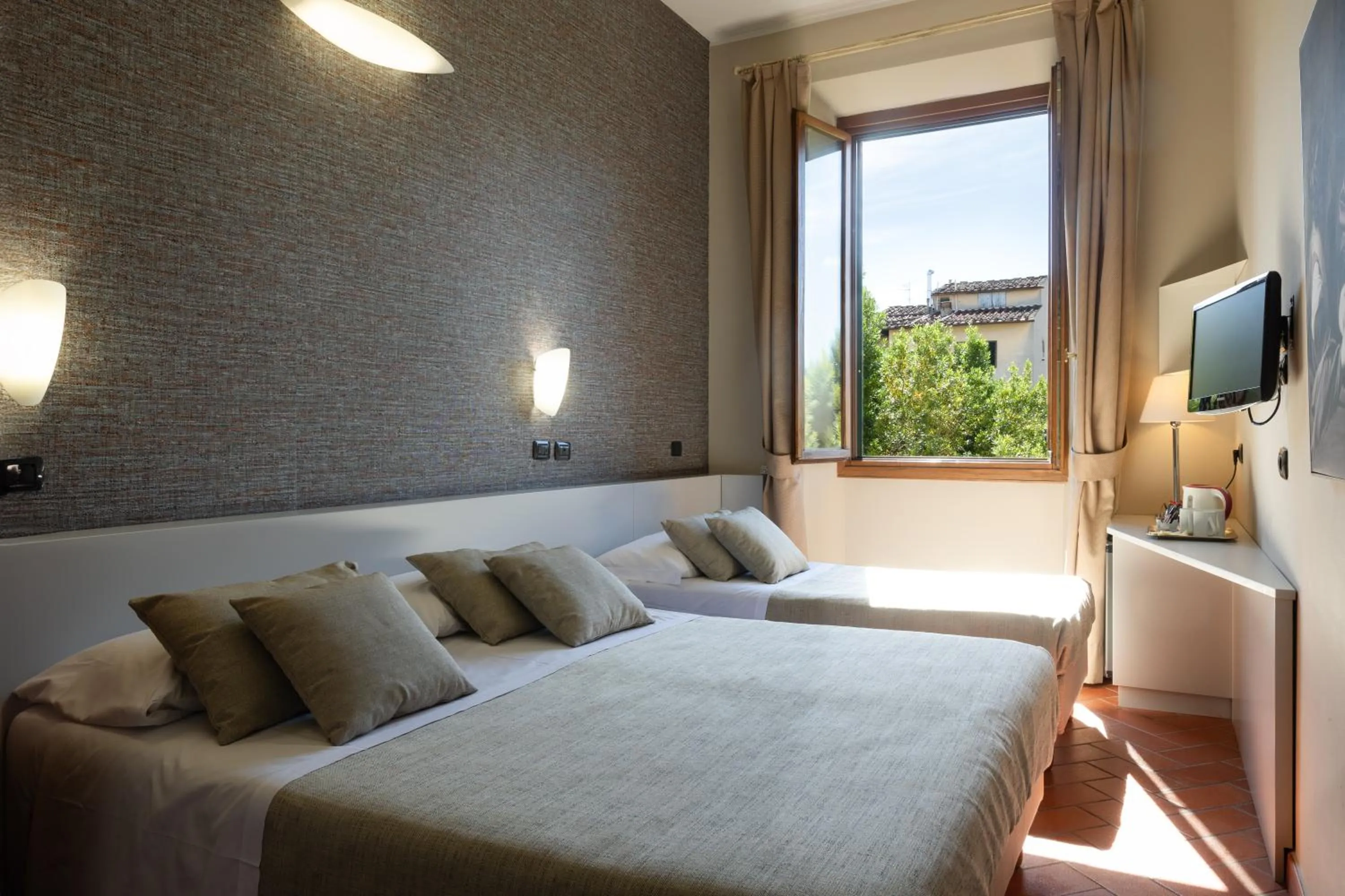 Bed in Hotel Caravaggio