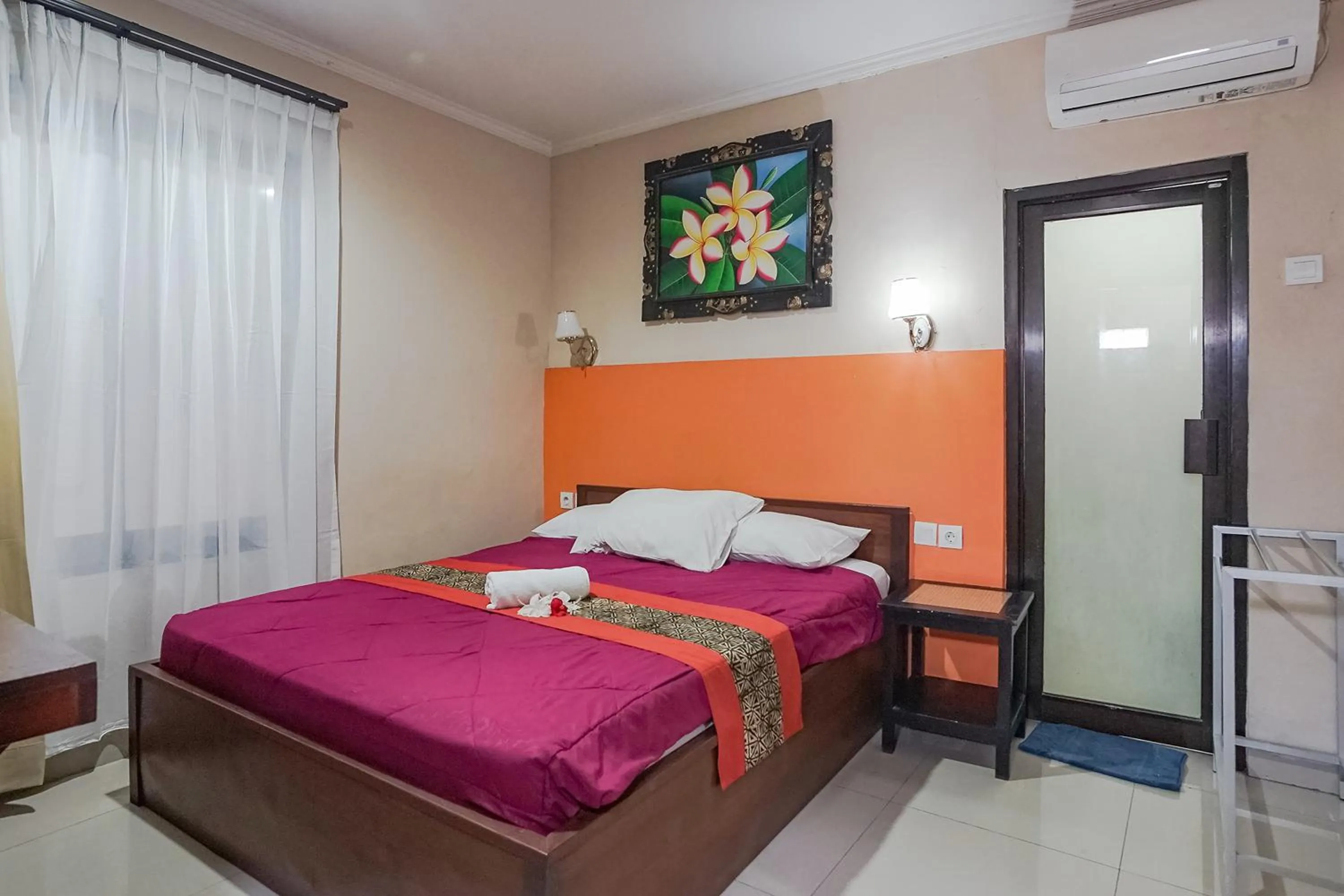 Bed in Taxa Uma Guest House