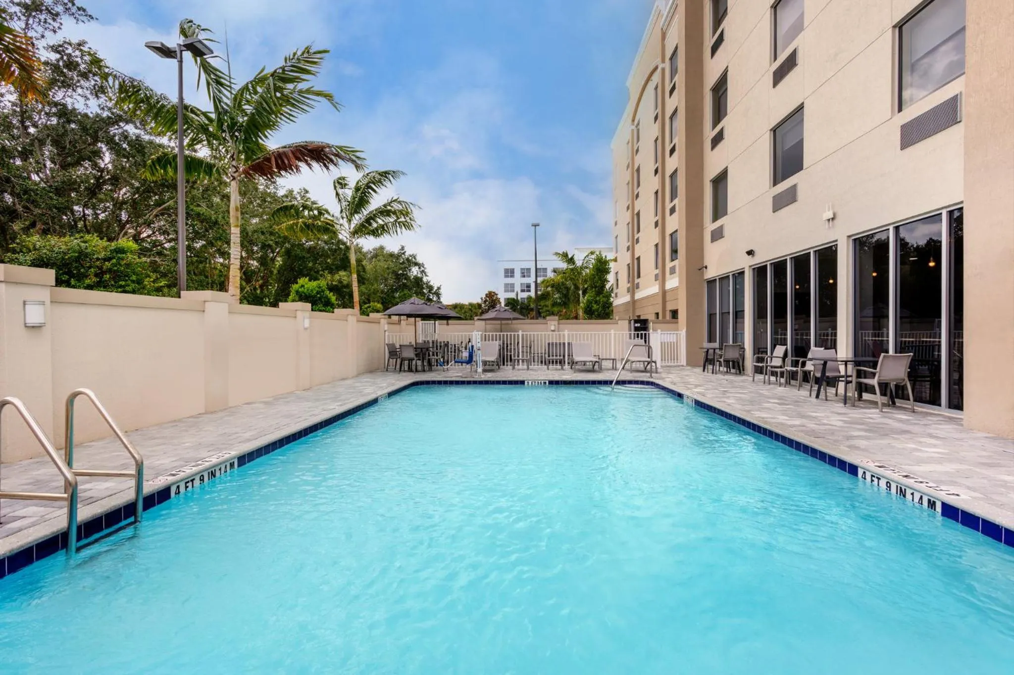 Swimming pool in Holiday Inn Express & Suites - Miramar by IHG