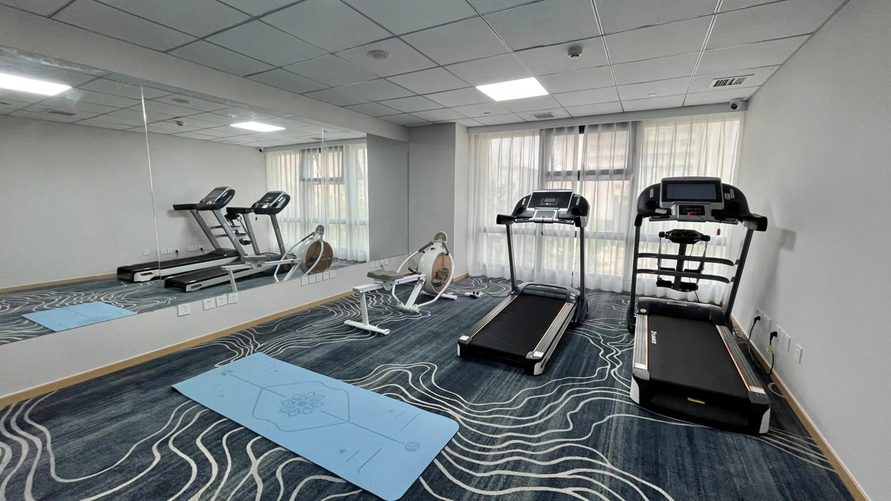 Fitness centre/facilities in Holiday Inn Express Qingdao City Center by IHG