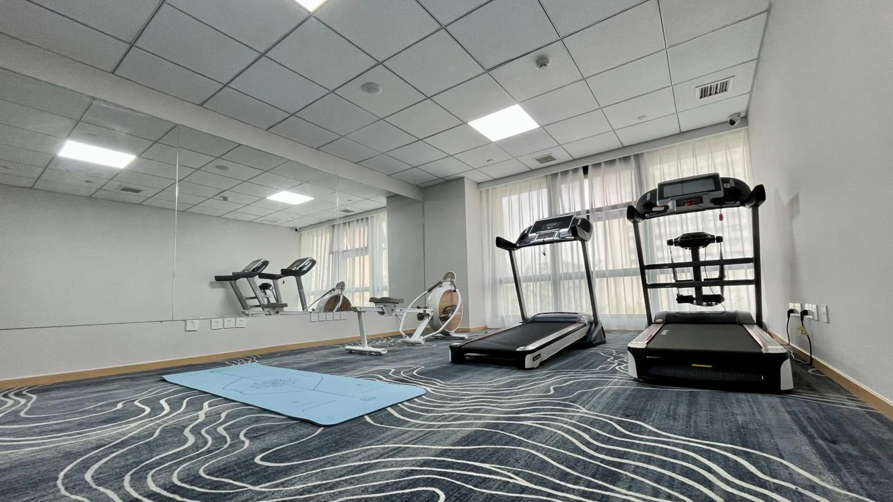 Fitness centre/facilities in Holiday Inn Express Qingdao City Center by IHG