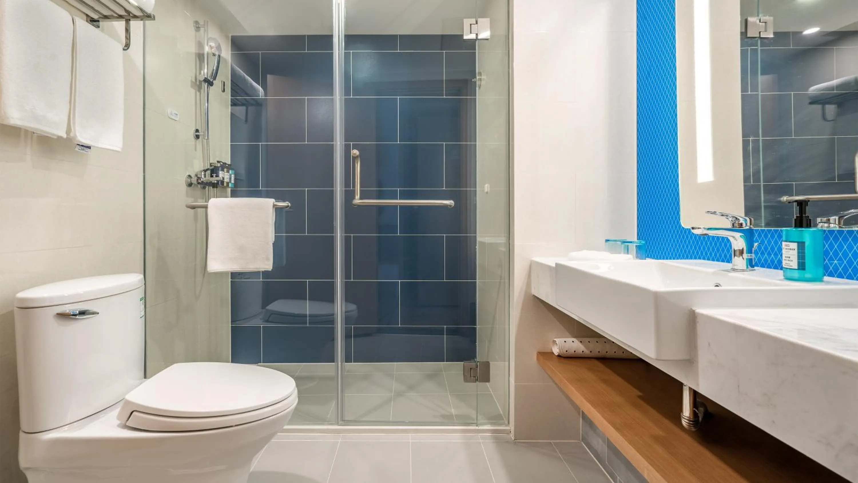 Shower in Holiday Inn Express Qingdao City Center by IHG