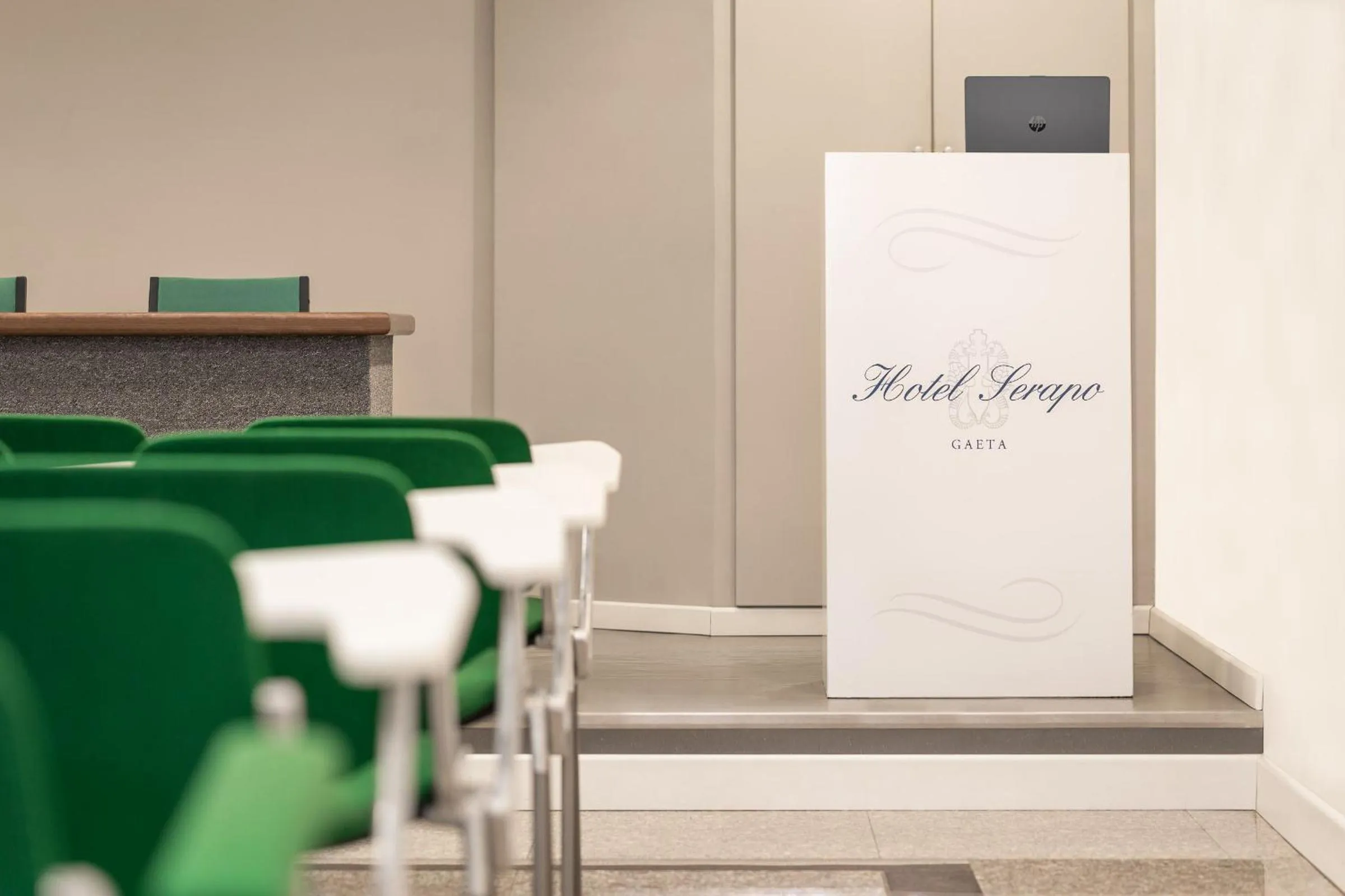 Property logo or sign in Hotel Serapo