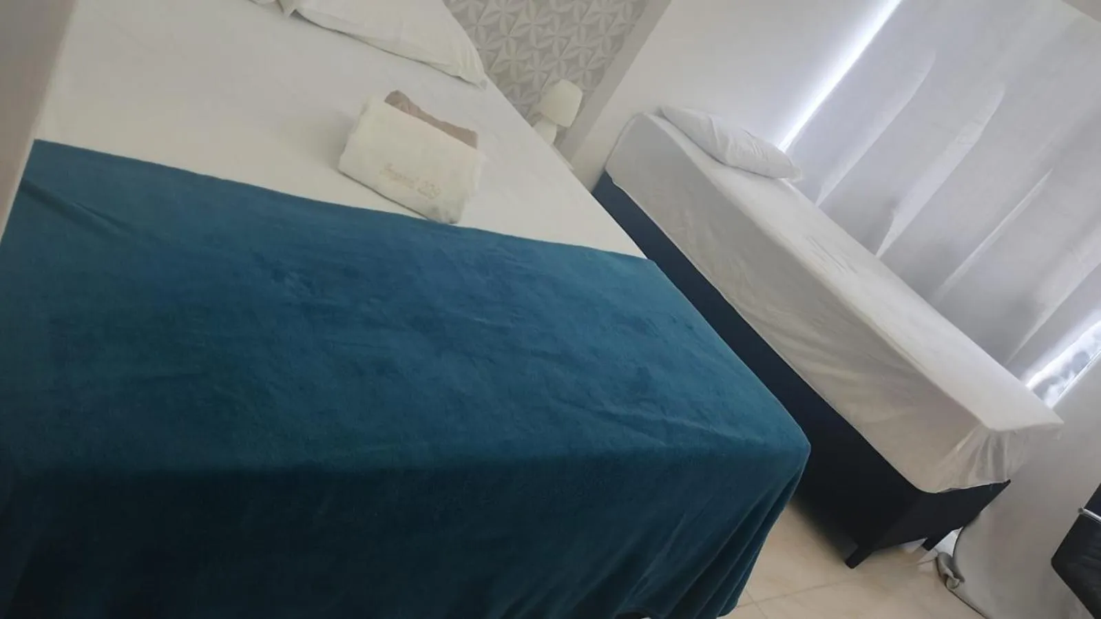 Bed in Hotel Imperial Suites