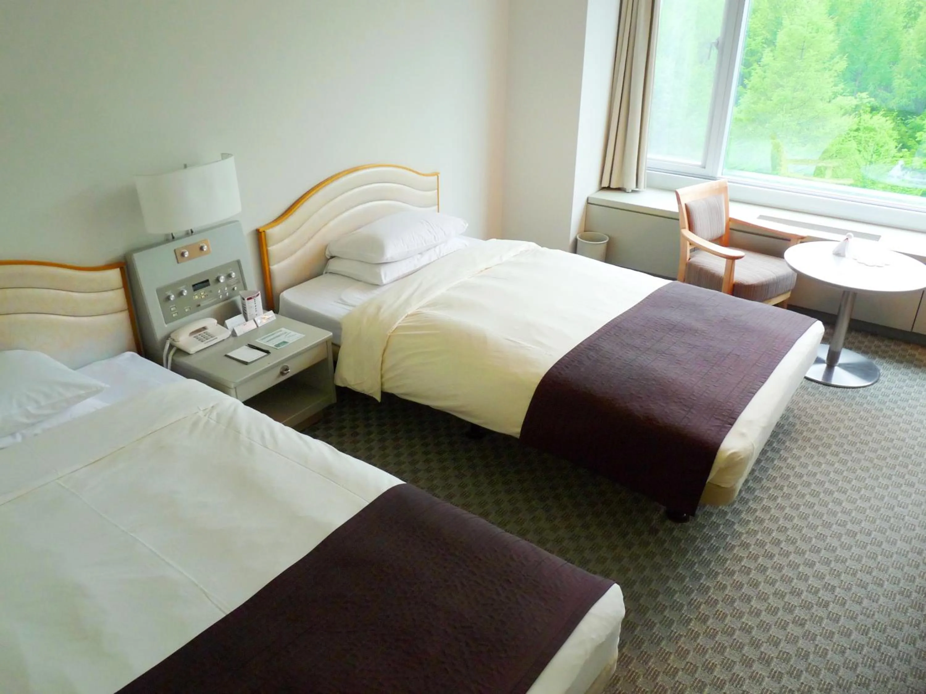 Bedroom, Bed in Shin Furano Prince Hotel