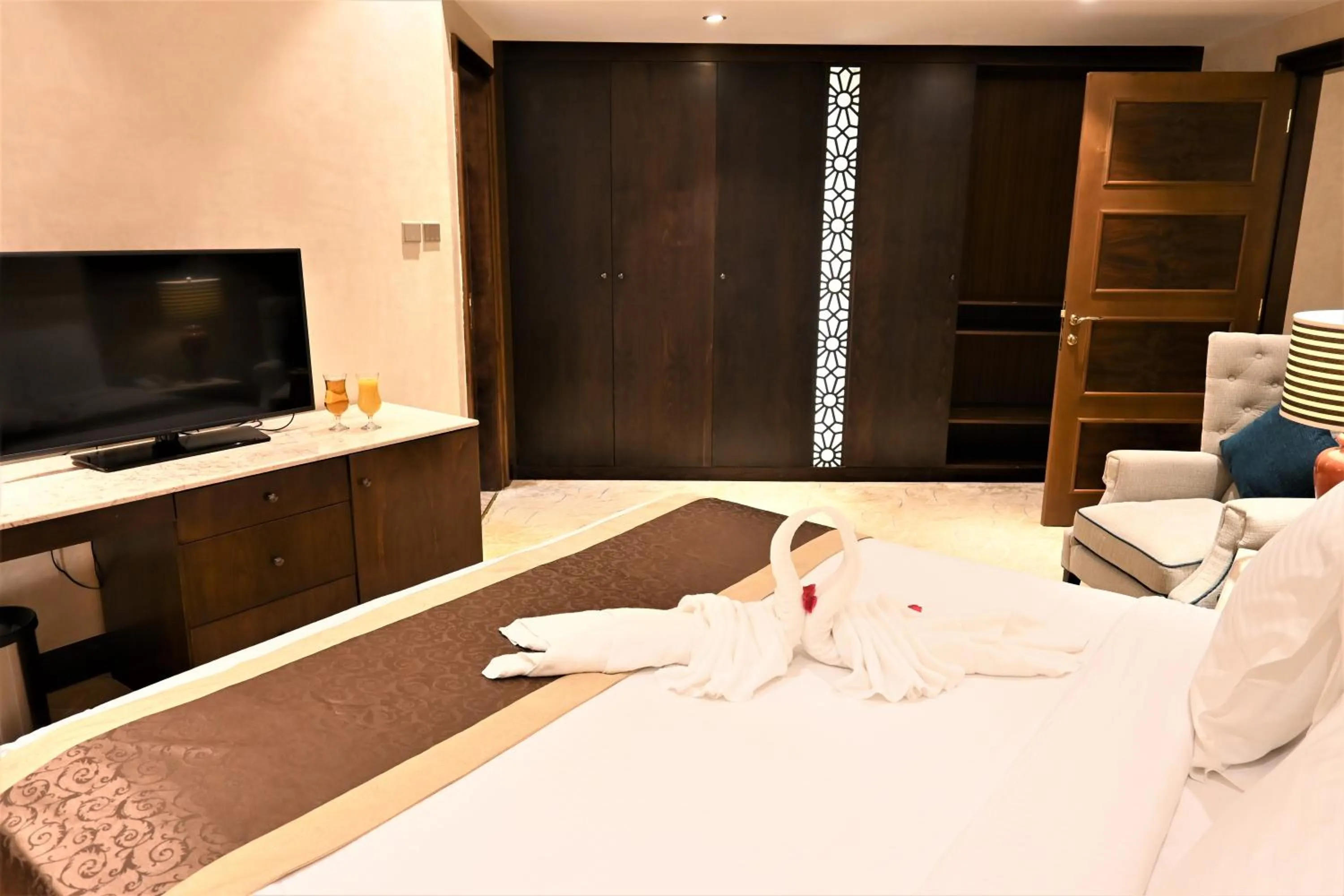 Bed in Crystal Plaza Al Majaz Hotel