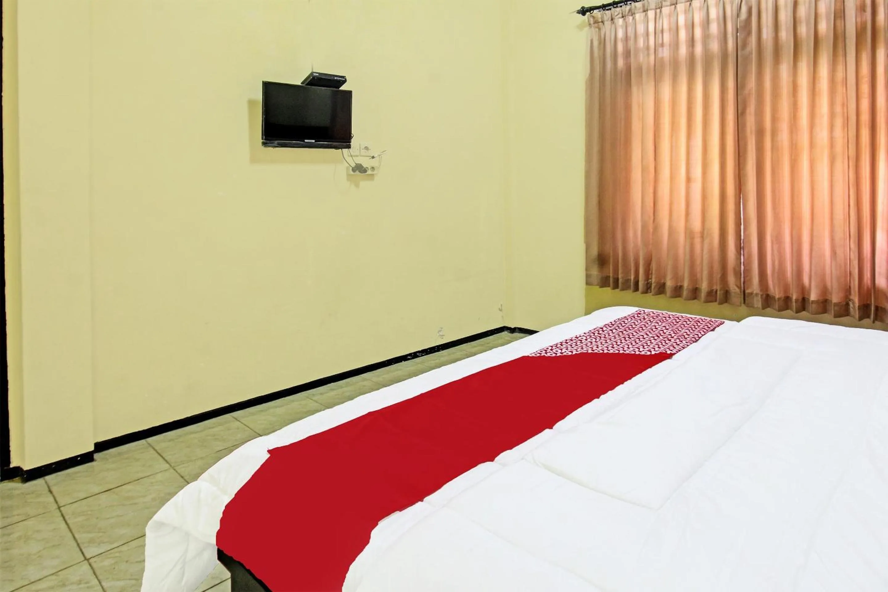 Bedroom in Hotel O Unram Guest House