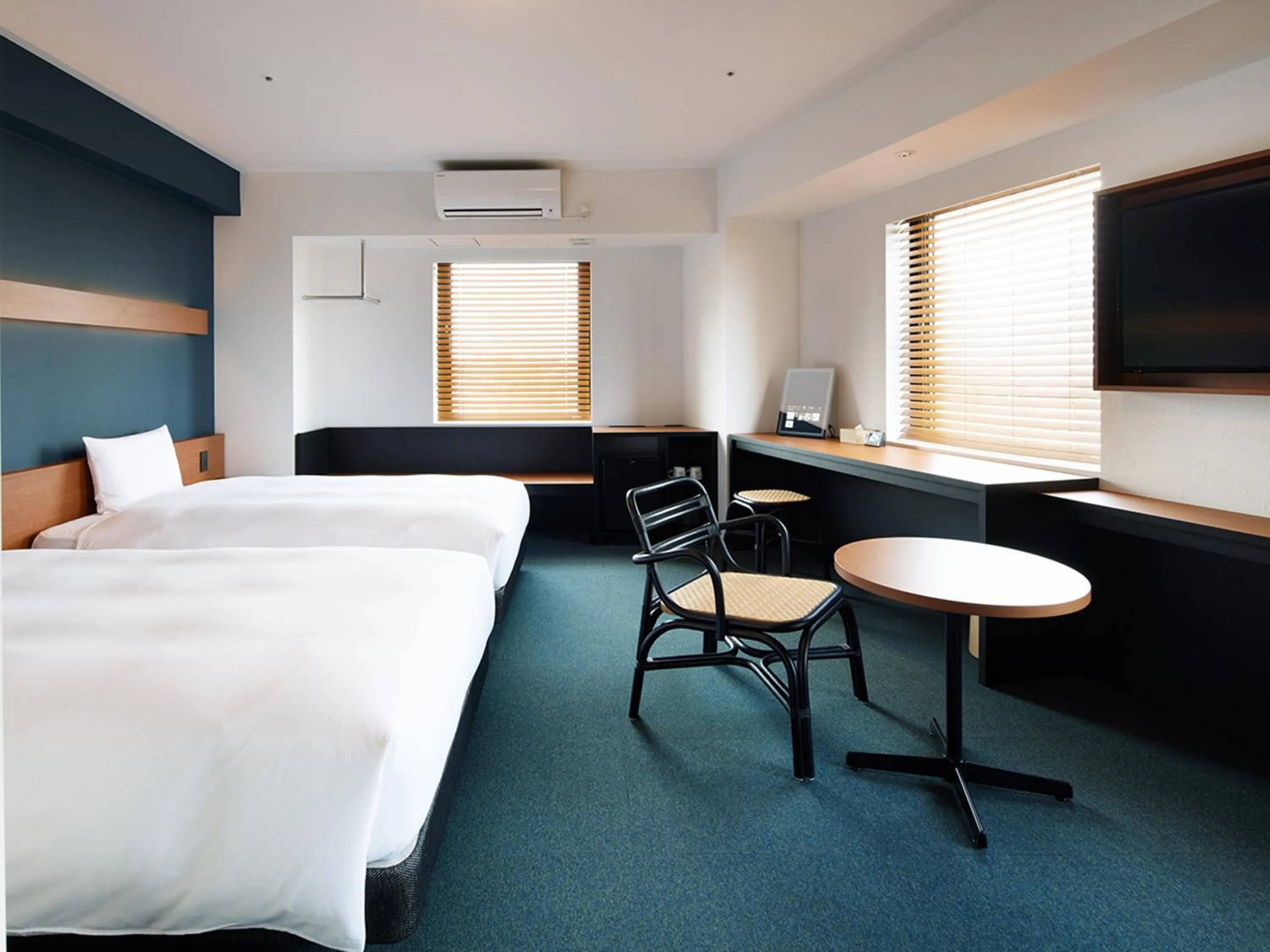 Photo of the whole room, Bed in hotel androoms Naha Port