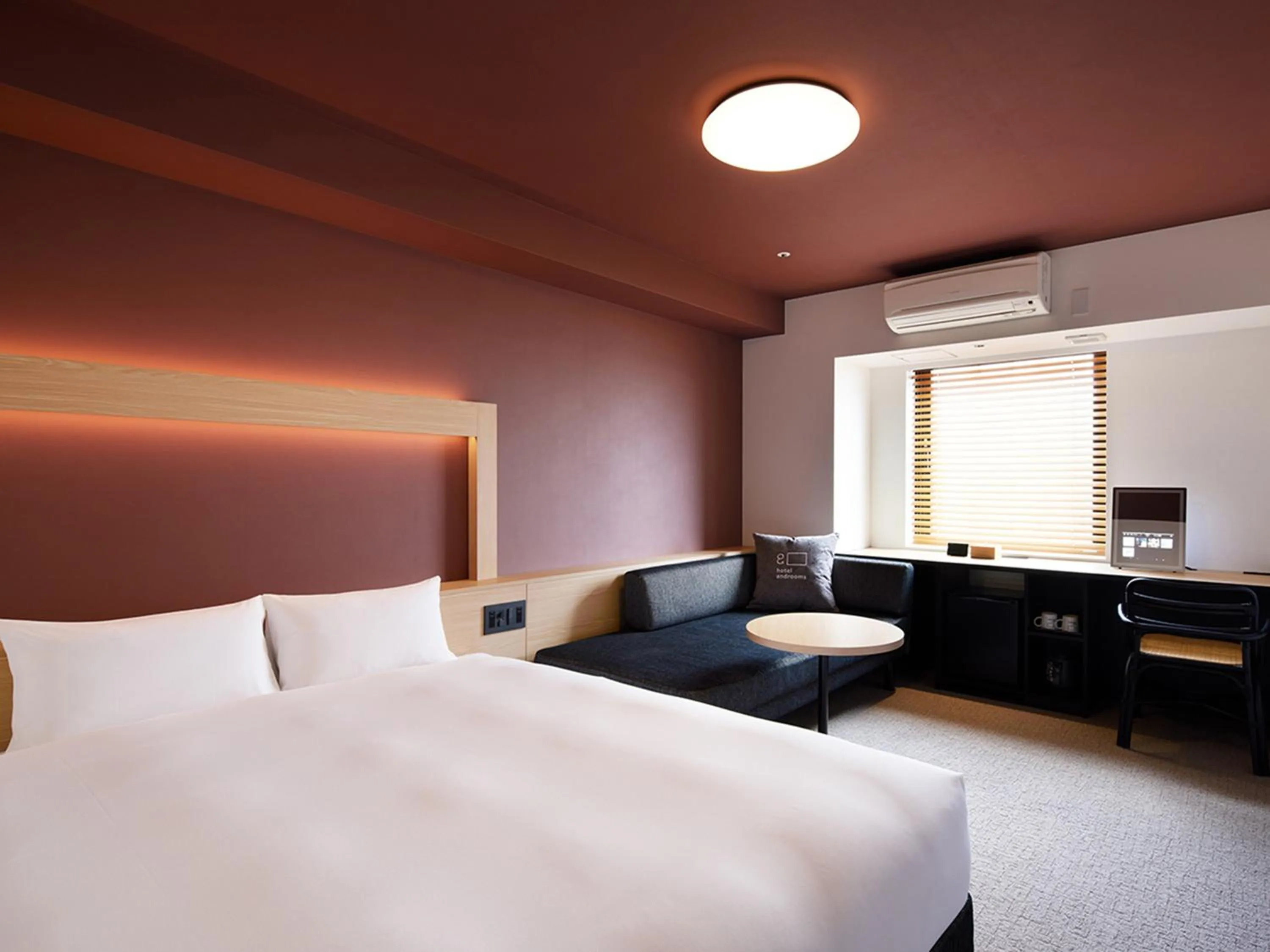 Photo of the whole room, Bed in hotel androoms Naha Port