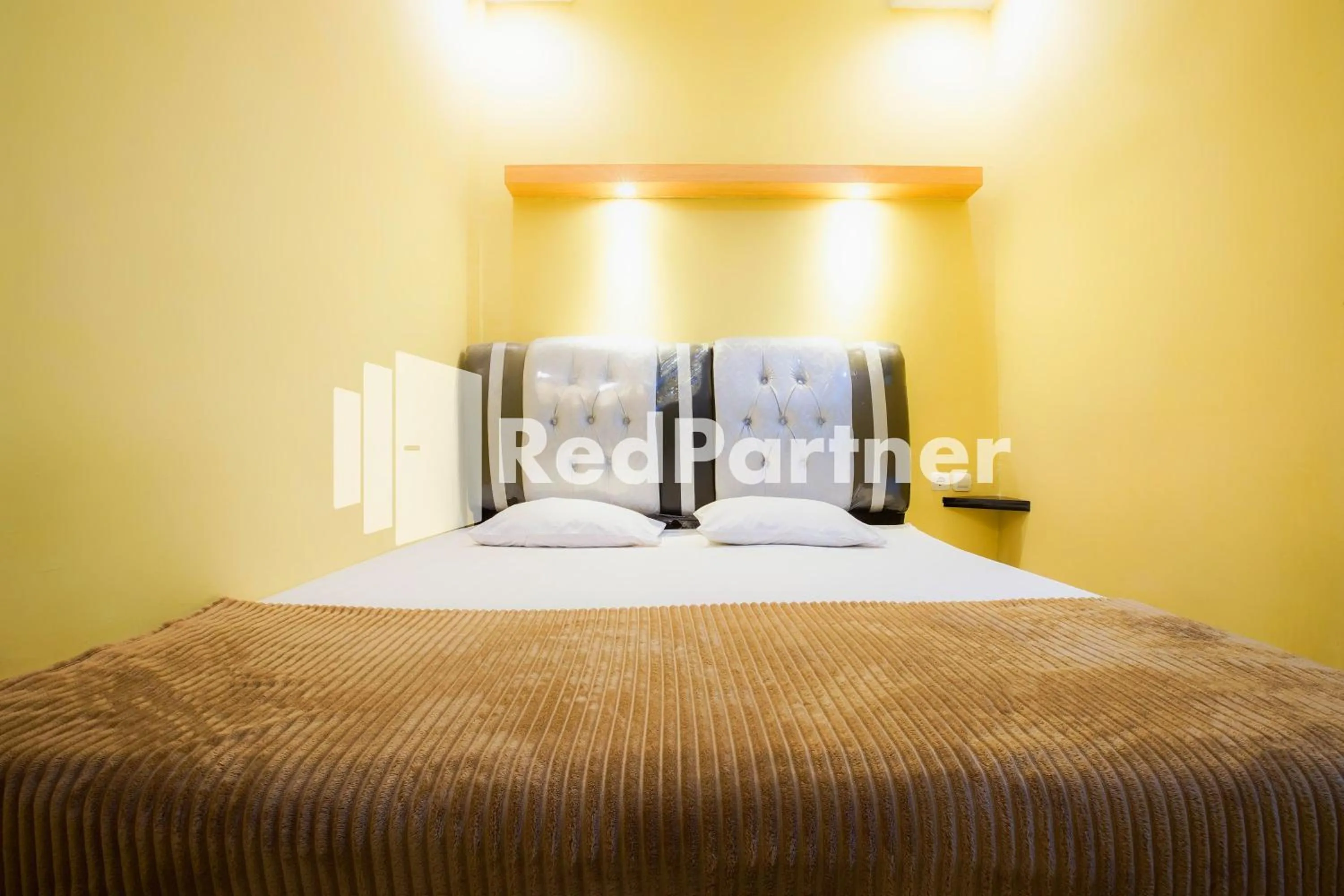 Bedroom, Bed in Hatta Guest House Syariah near Hayam Wuruk Jelutung Mitra RedDoorz