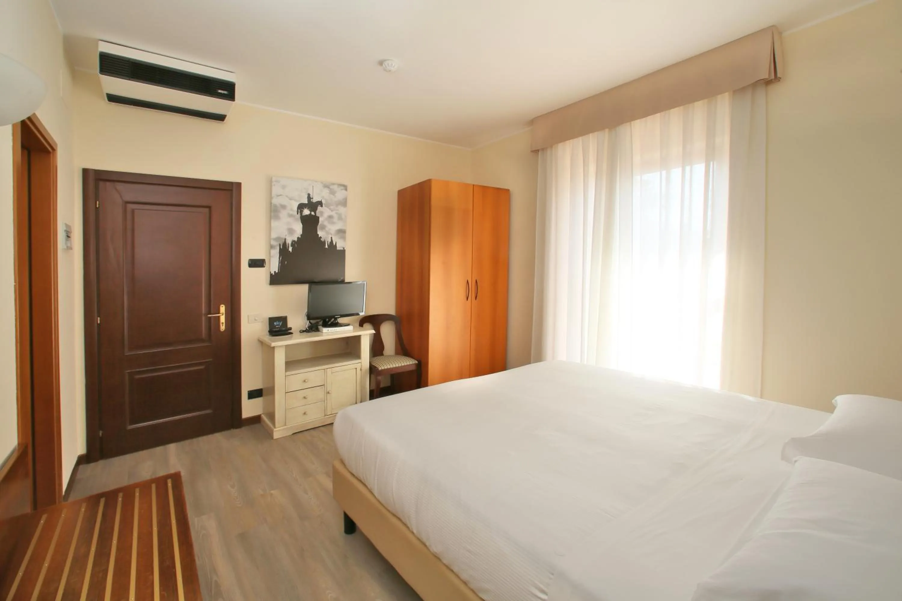 Photo of the whole room, Bed in Veronello Resort