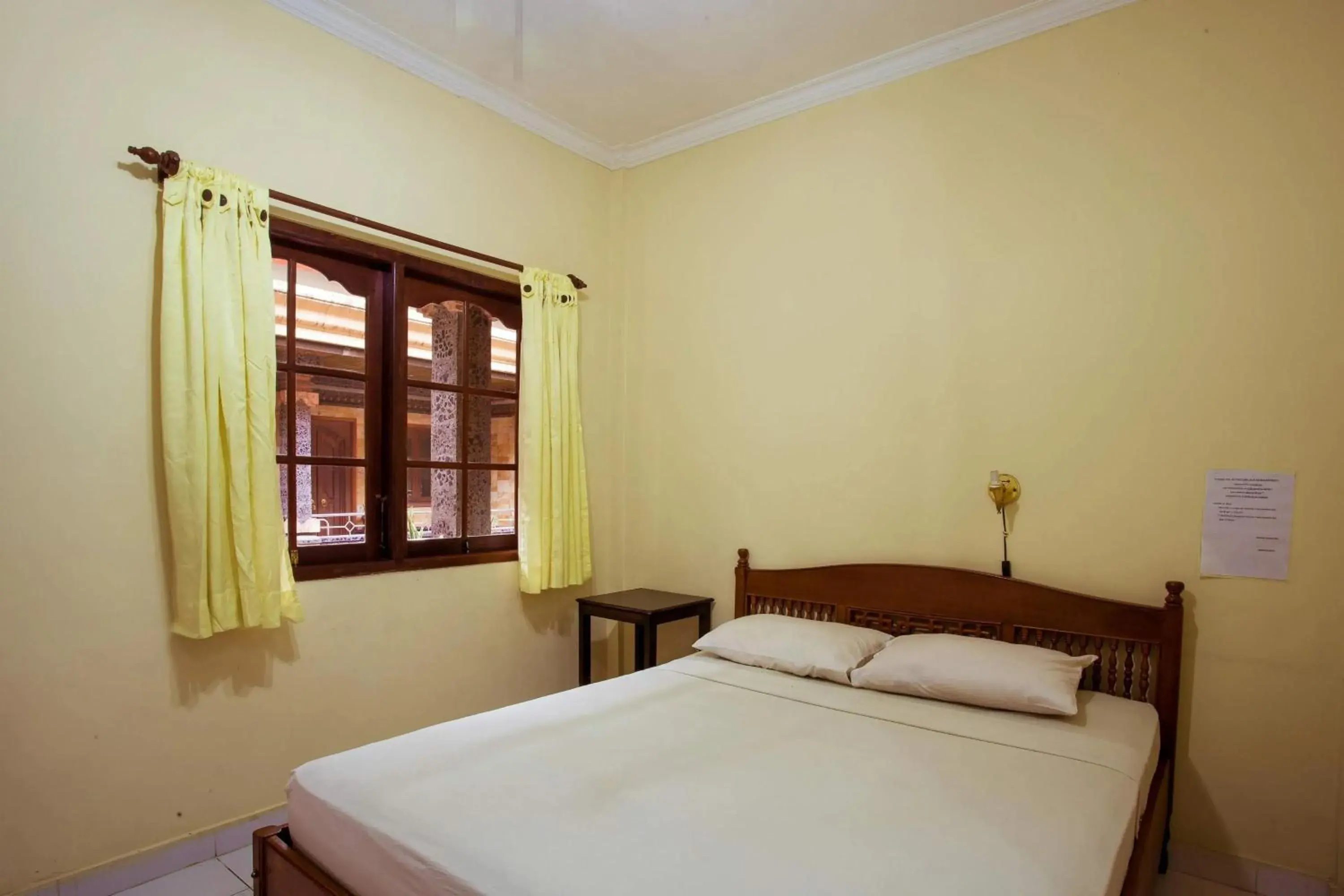 Standard Double or Twin Room with Fan in Segara Sadhu Inn Kuta by ecommerceloka Standard Double or Twin Room with Fan in Segara Sadhu Inn Kuta by ecommerceloka