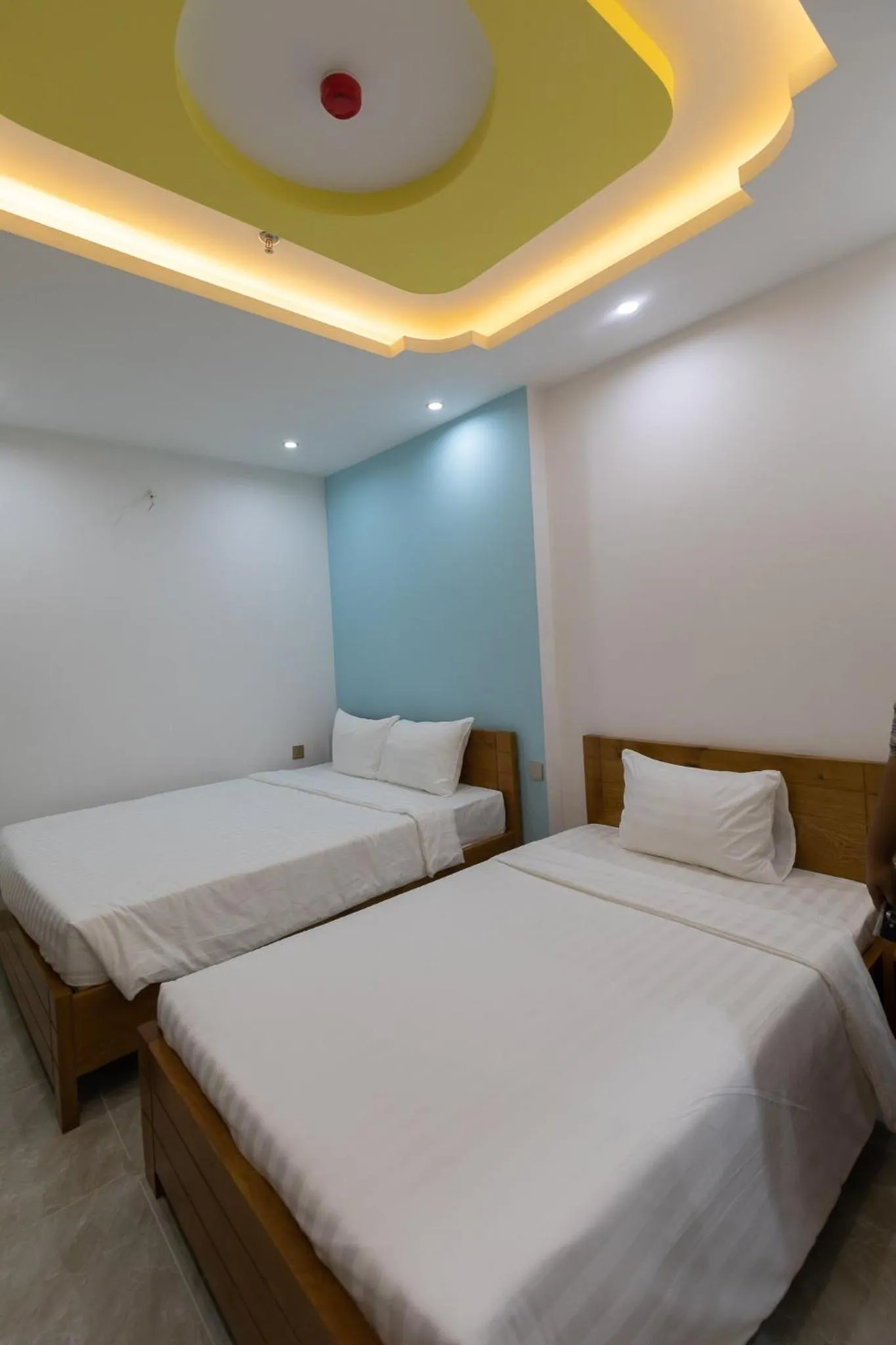 Bed in 26 Topaz Hotel