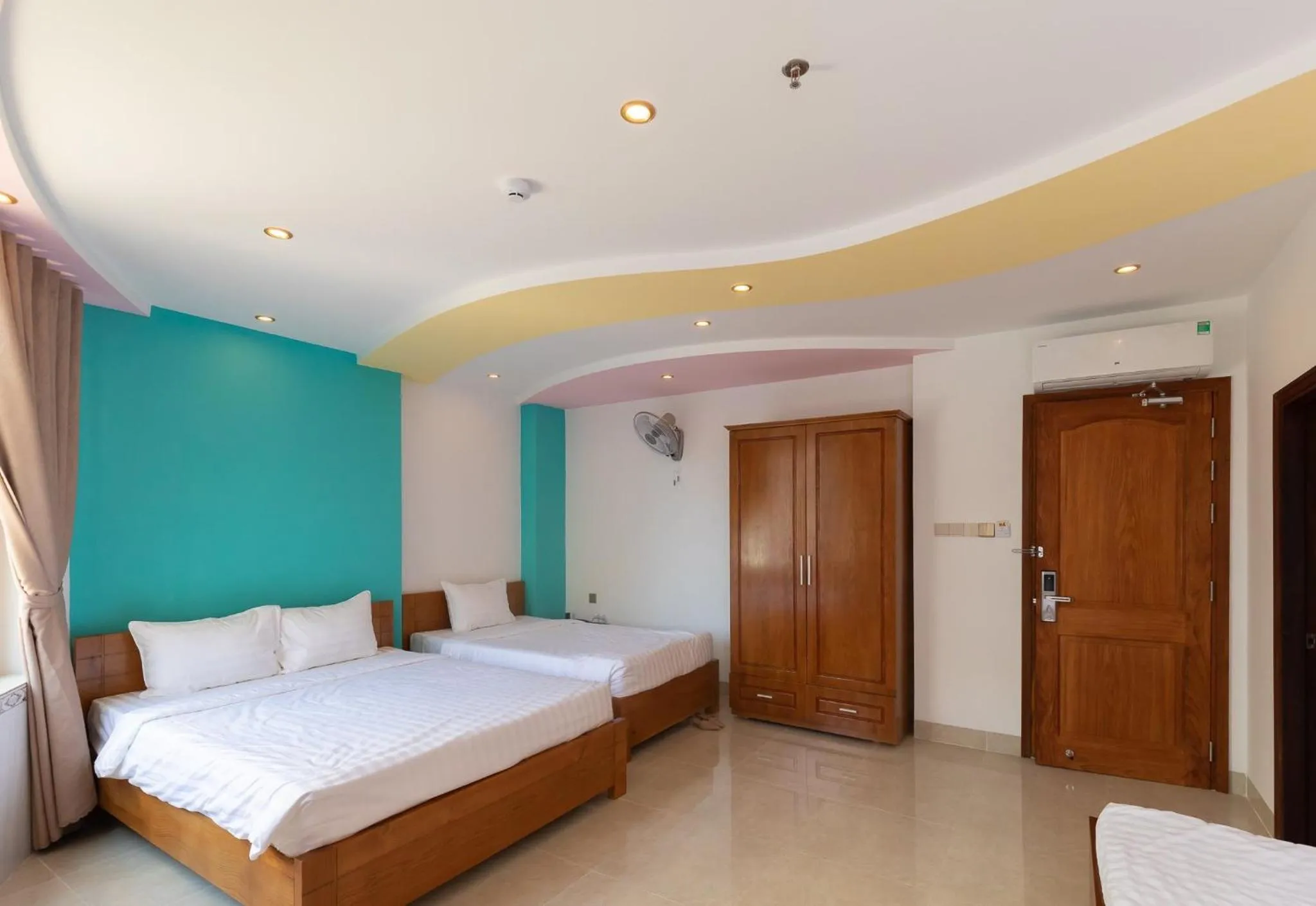 Bed in 26 Topaz Hotel