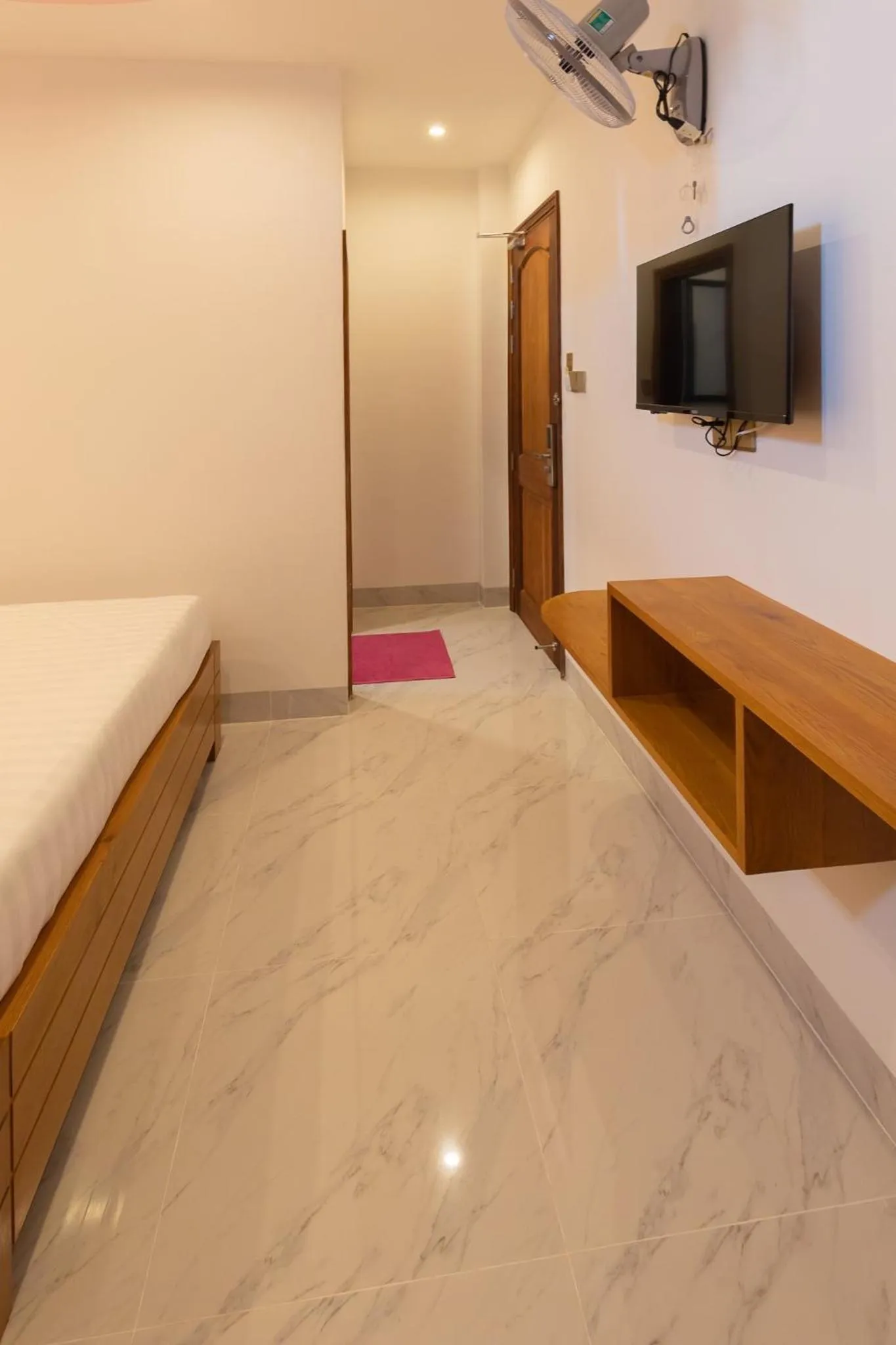 Bed in 26 Topaz Hotel