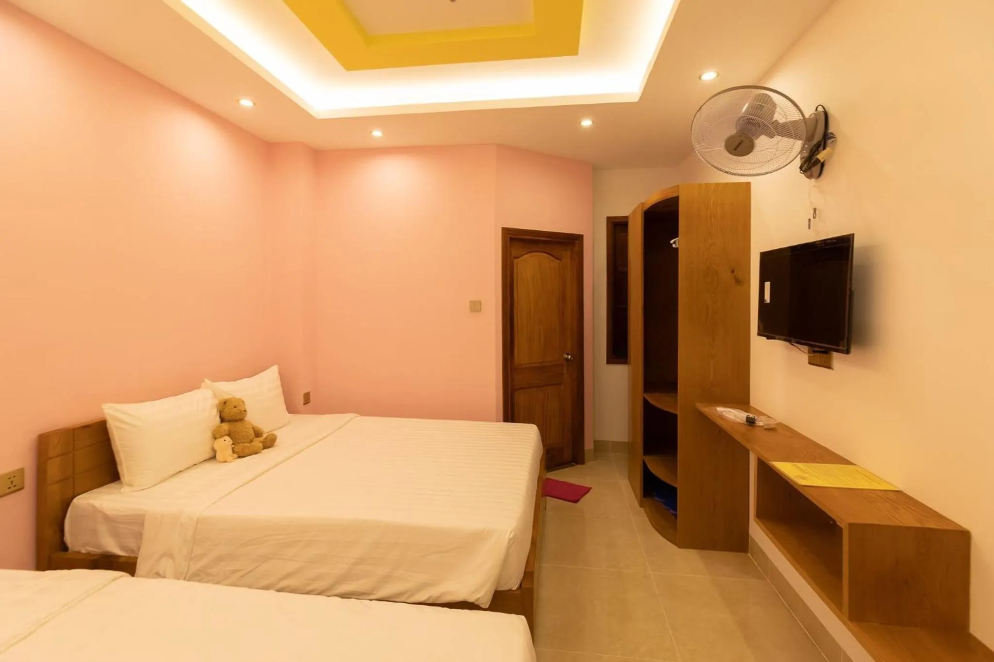 Bed in 26 Topaz Hotel