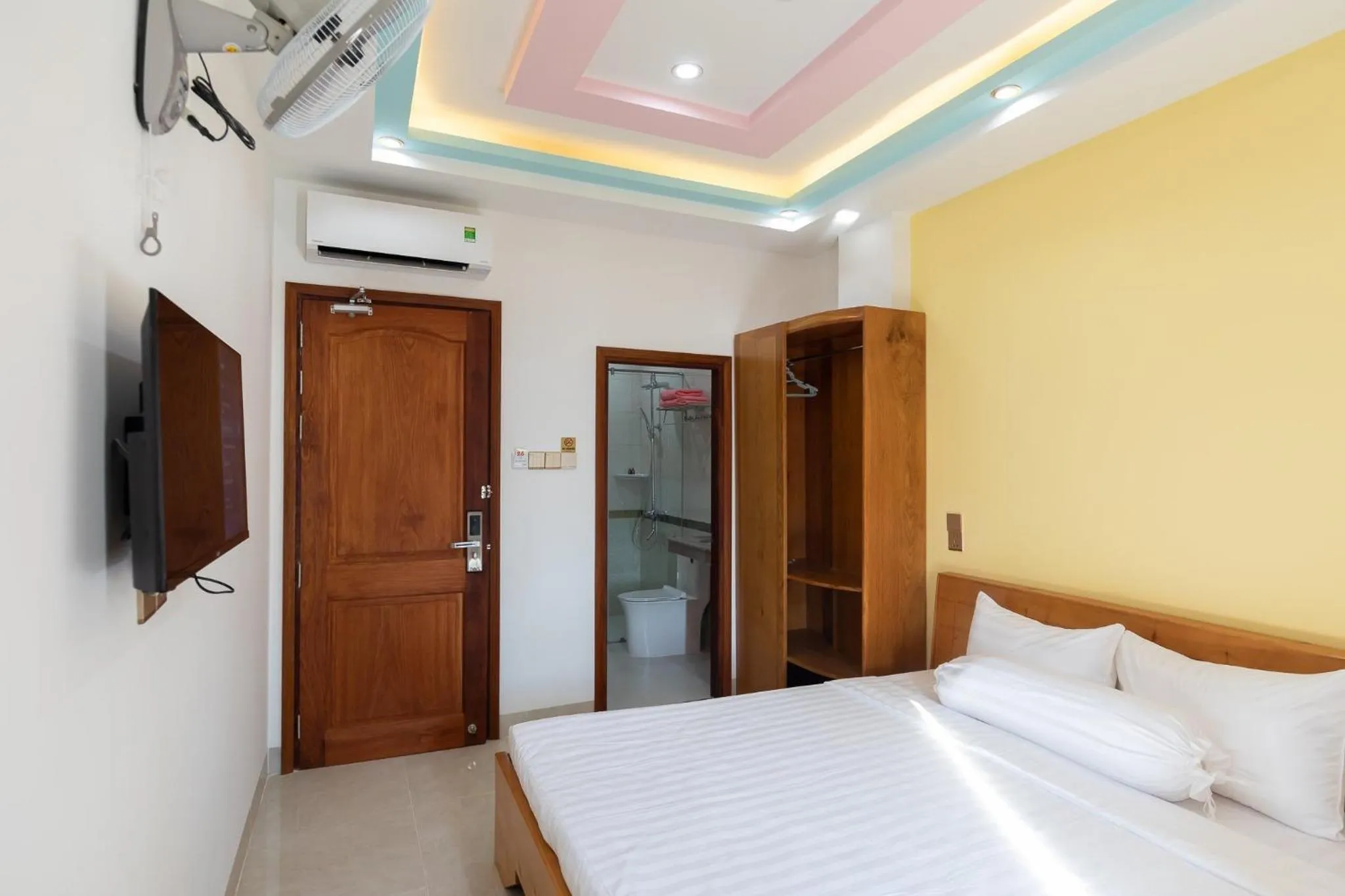 Bed in 26 Topaz Hotel