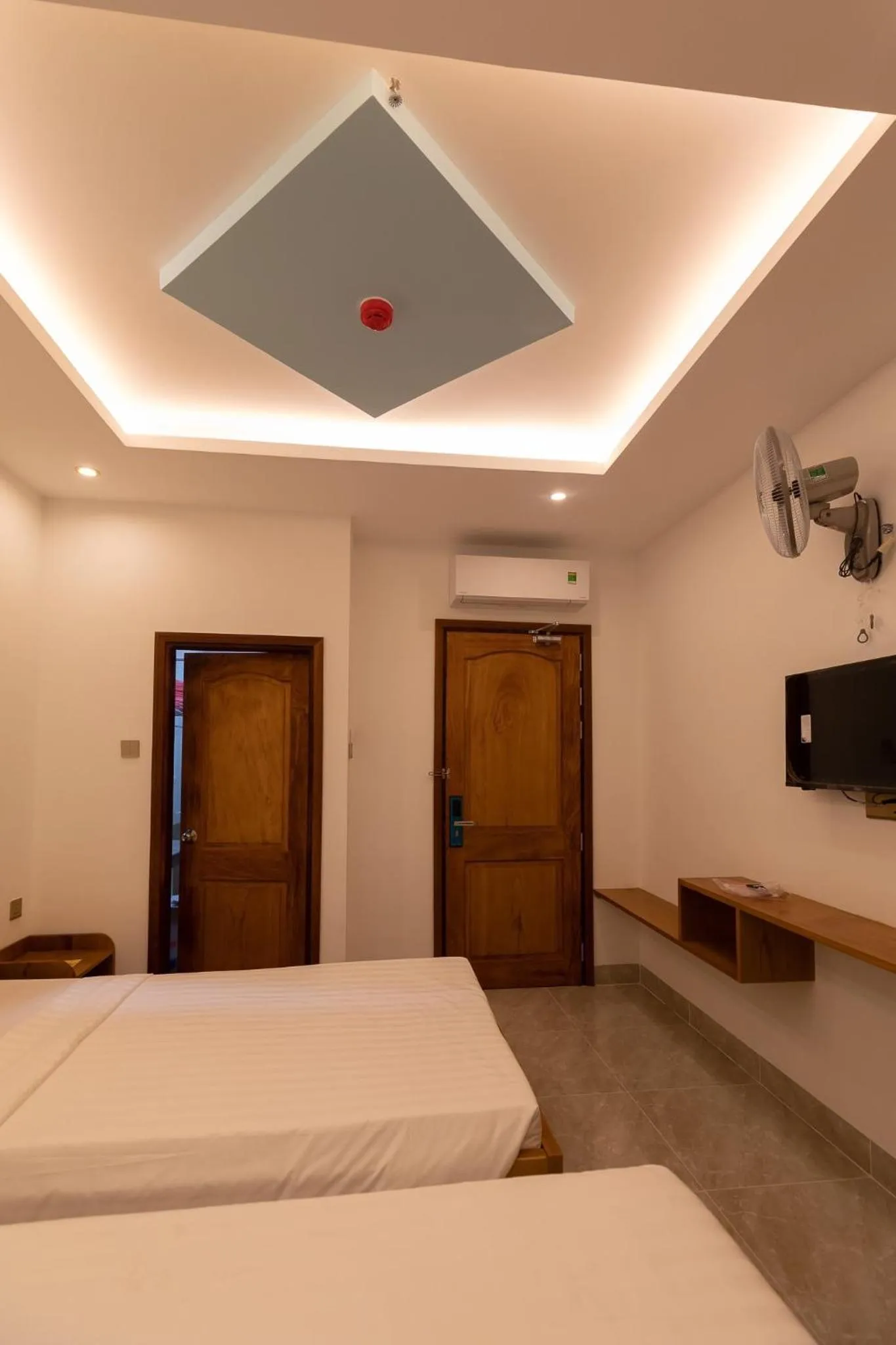 Bed in 26 Topaz Hotel