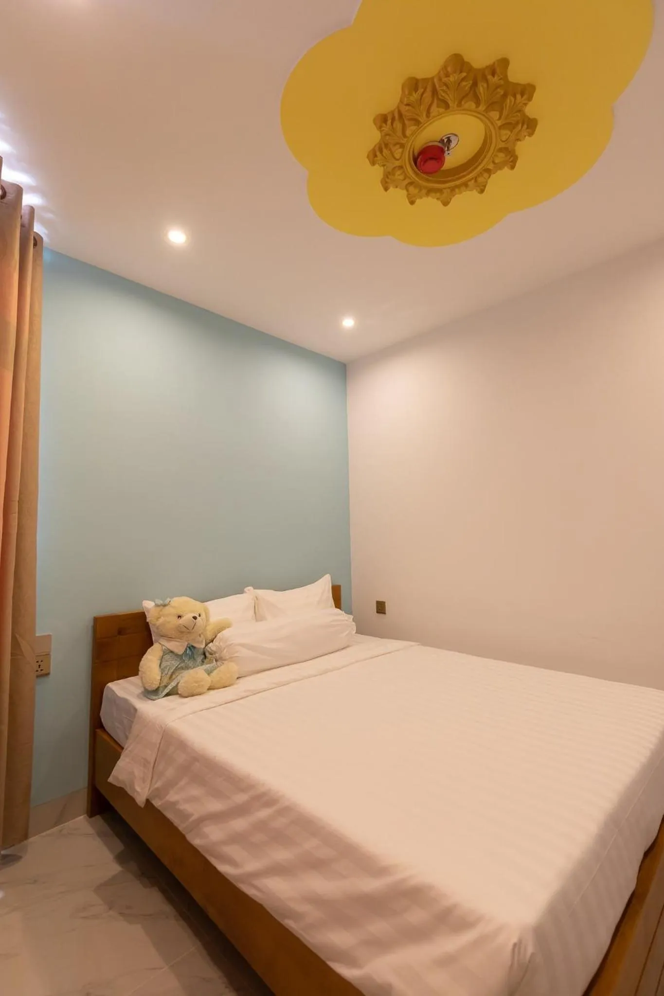 Bed in 26 Topaz Hotel