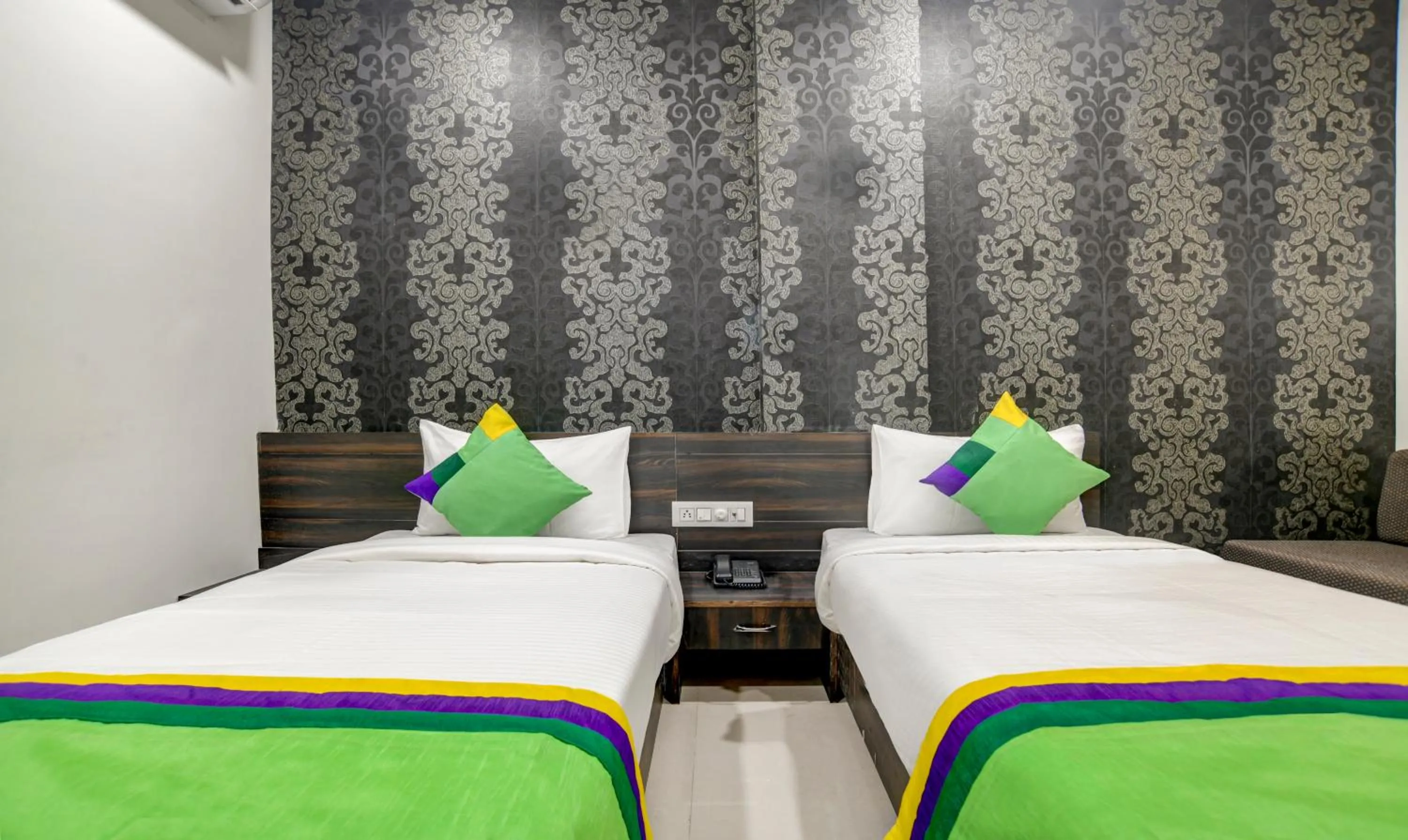 Bedroom, Bed in Treebo Grand Euro Pipliyahana Square