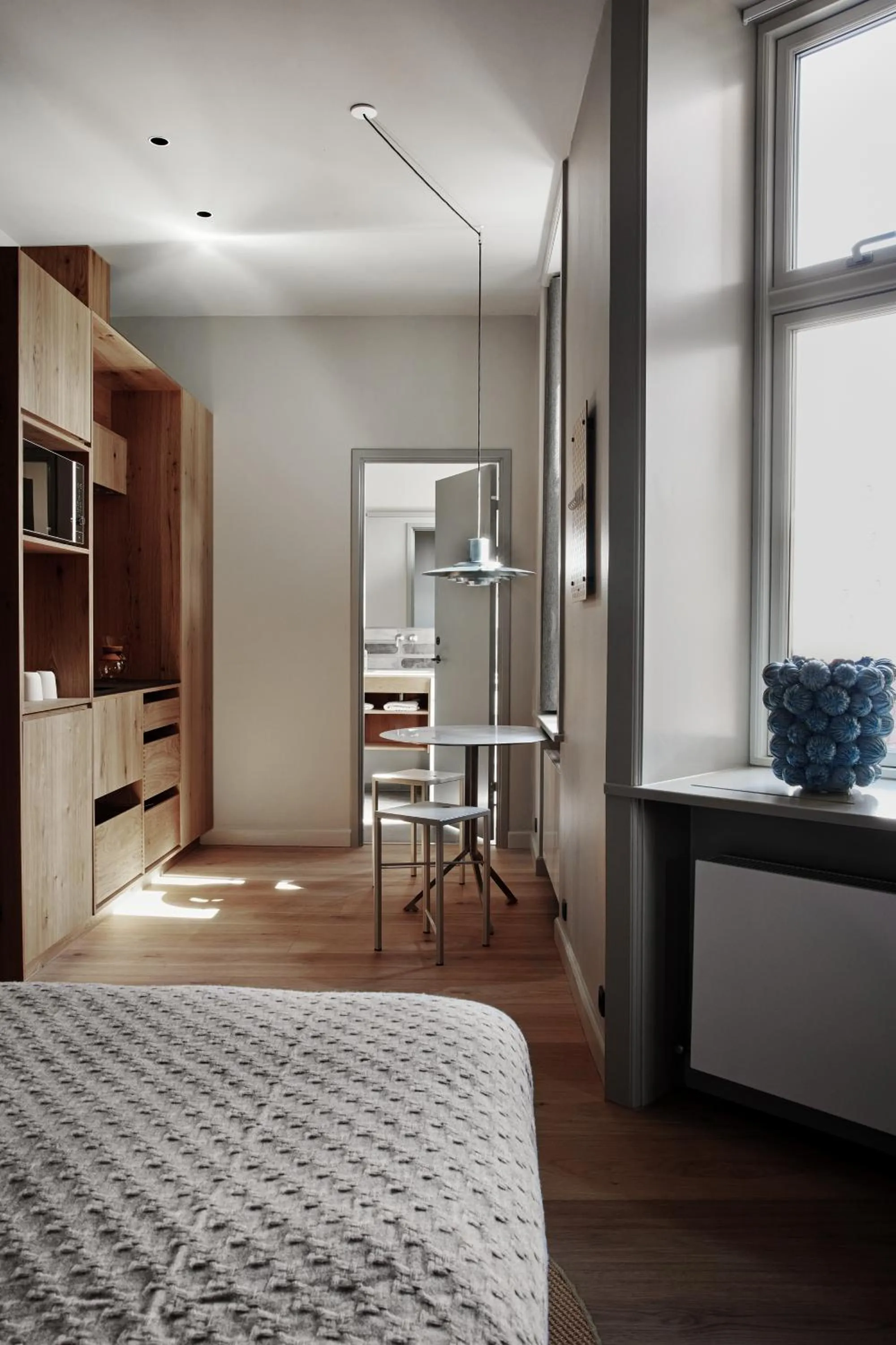 Seating area, Bed in Apartments by Brøchner Hotels