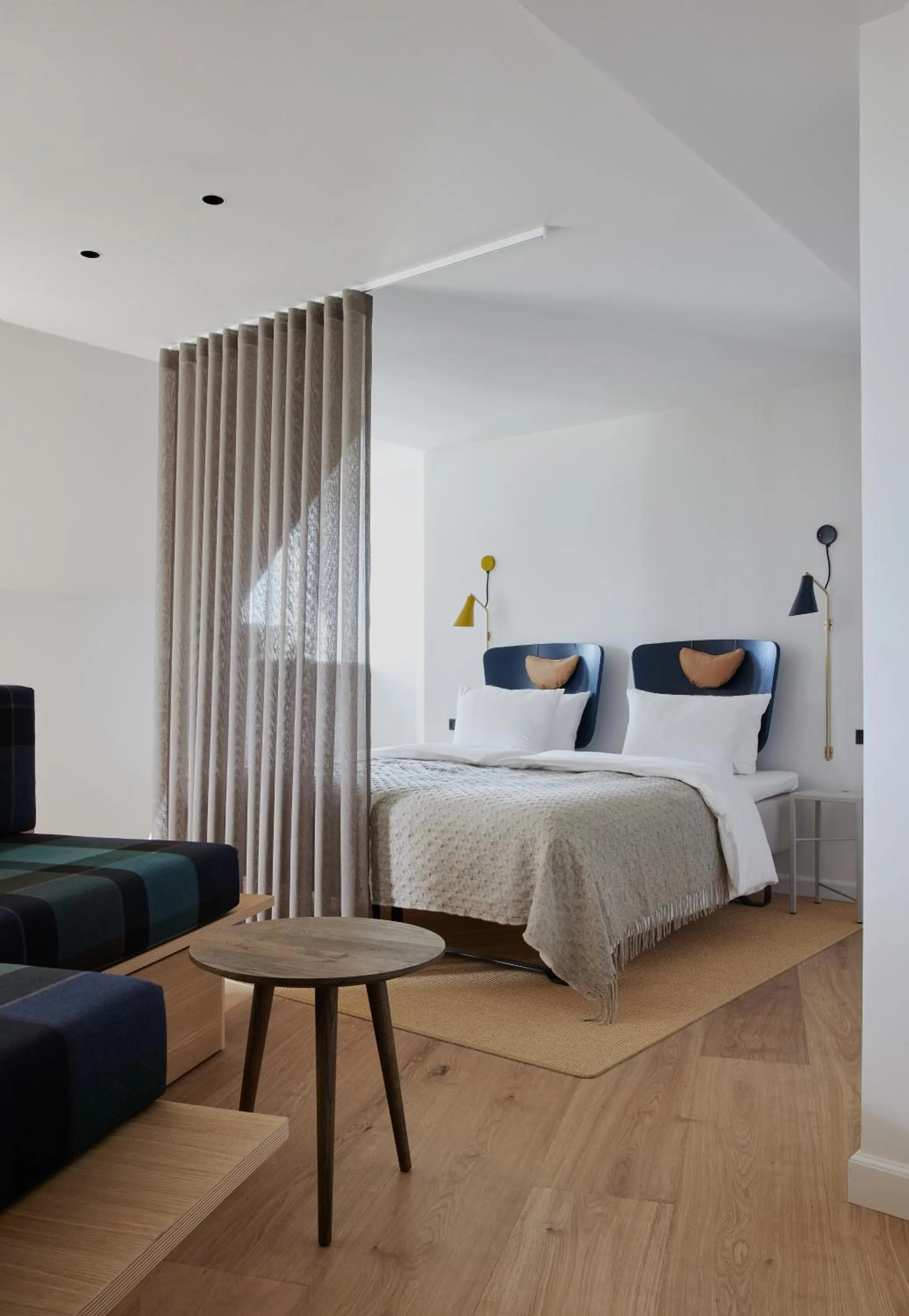 Bed in Apartments by Brøchner Hotels