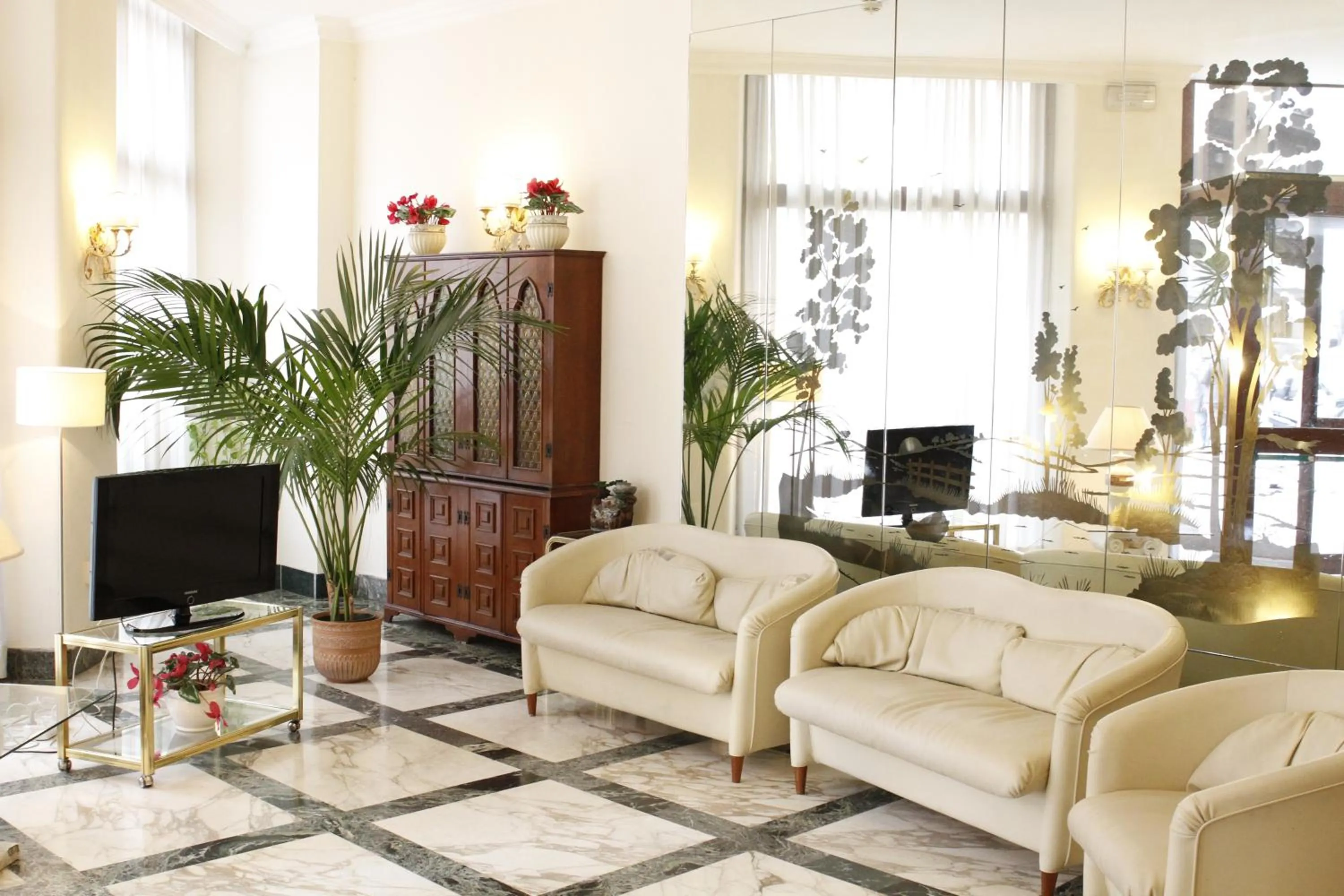 Lobby or reception in GH Hotel San Giusto