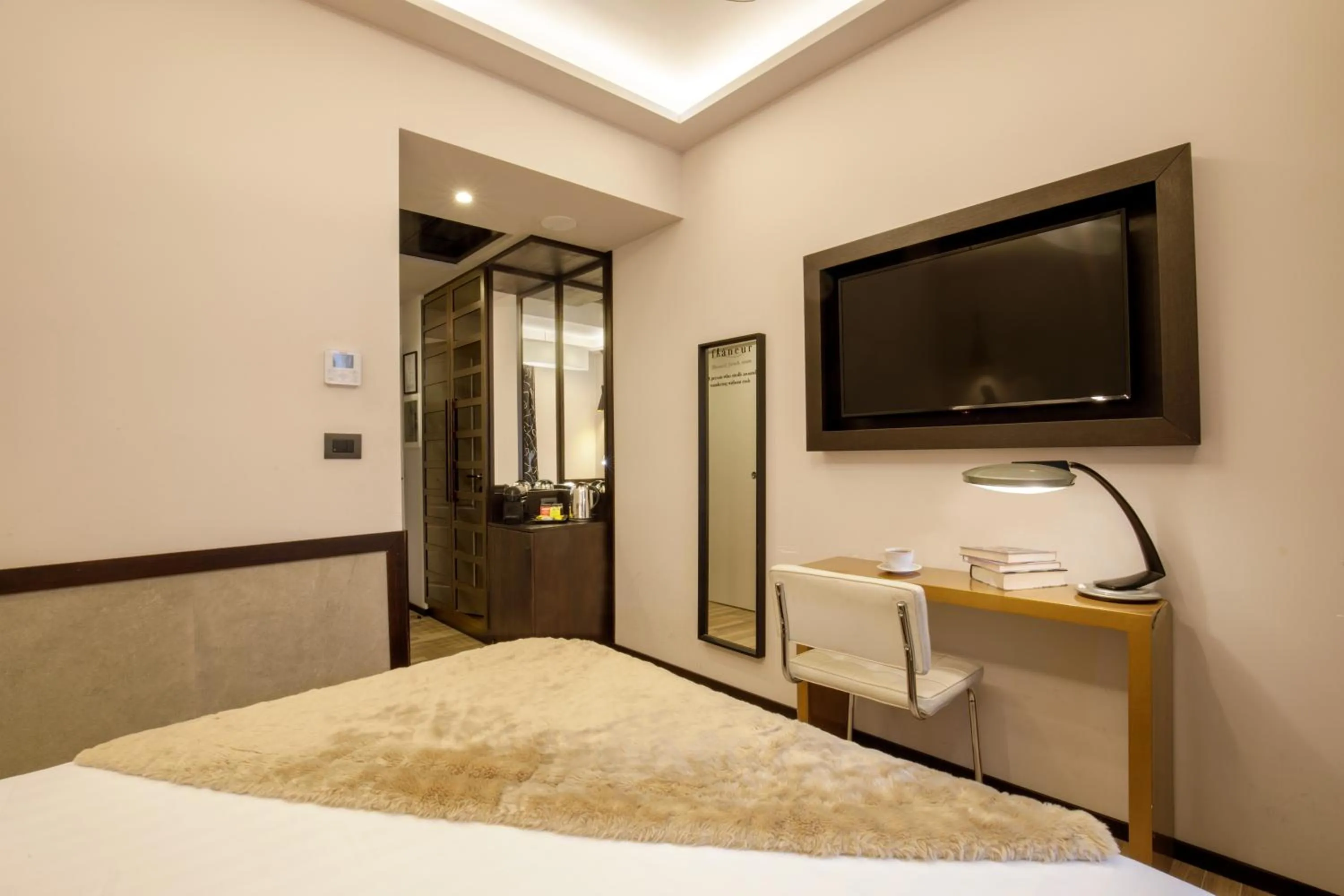 Bed in Flâneur Suites Corso