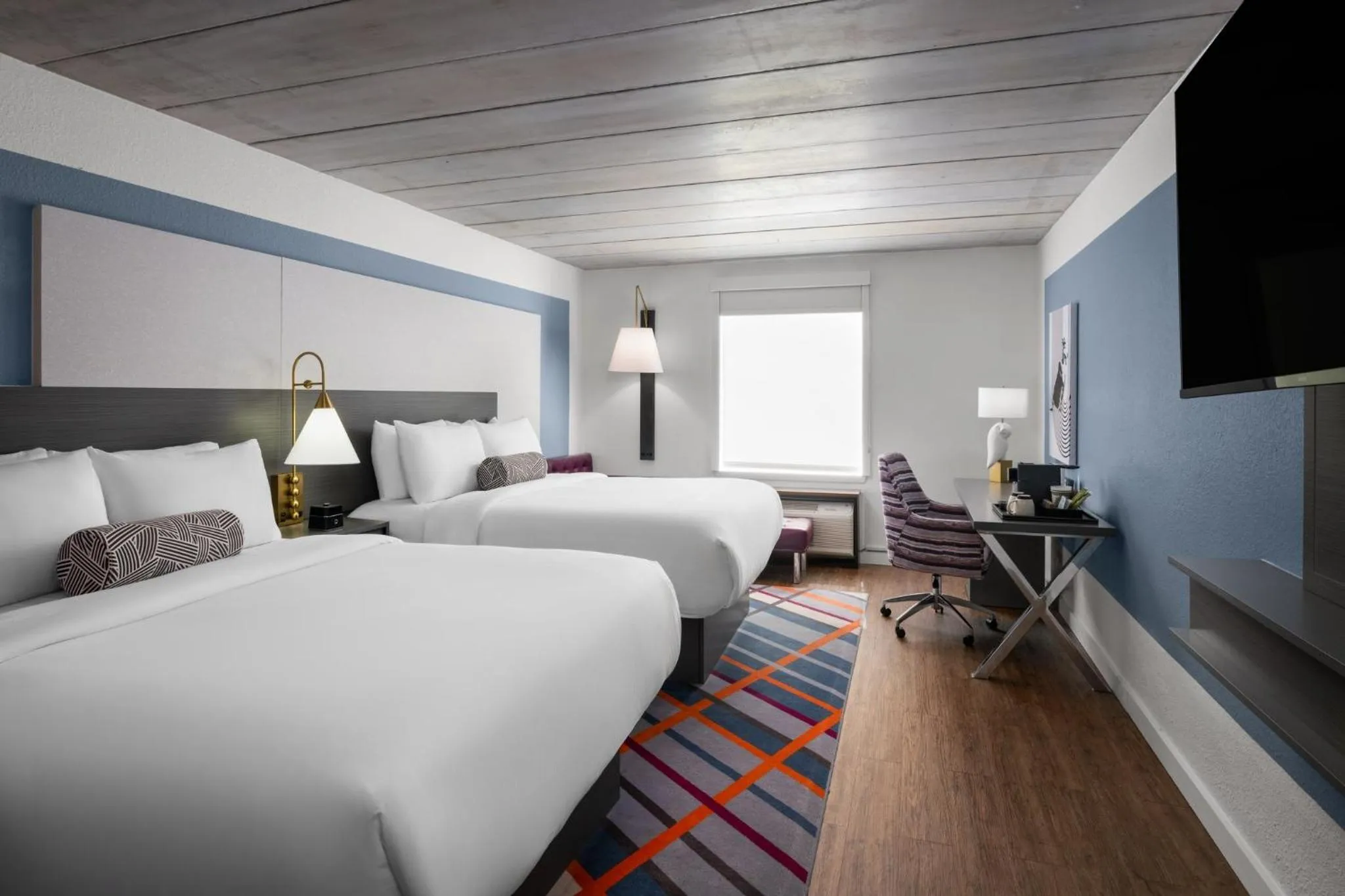 Photo of the whole room, Bed in voco College Station Aggieland by IHG